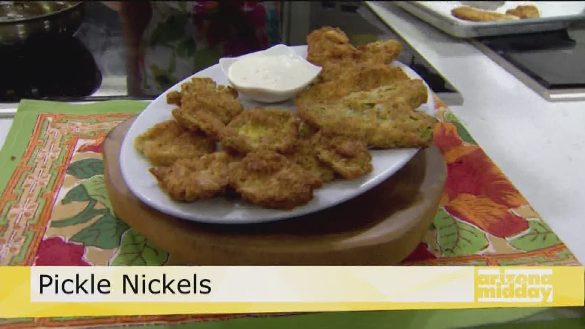 They're a super popular game day snack! Jan's in the kitchen makin' deep fried pickles!