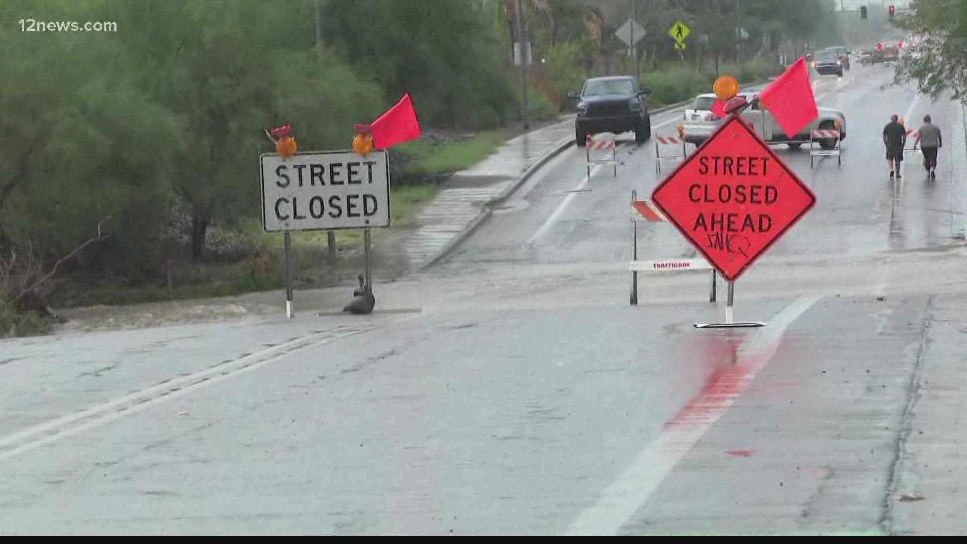 Entire roadways were washed away in north Phoenix on Wednesday. And as some of the floodwaters recede, people living nearby are left dealing with damage.