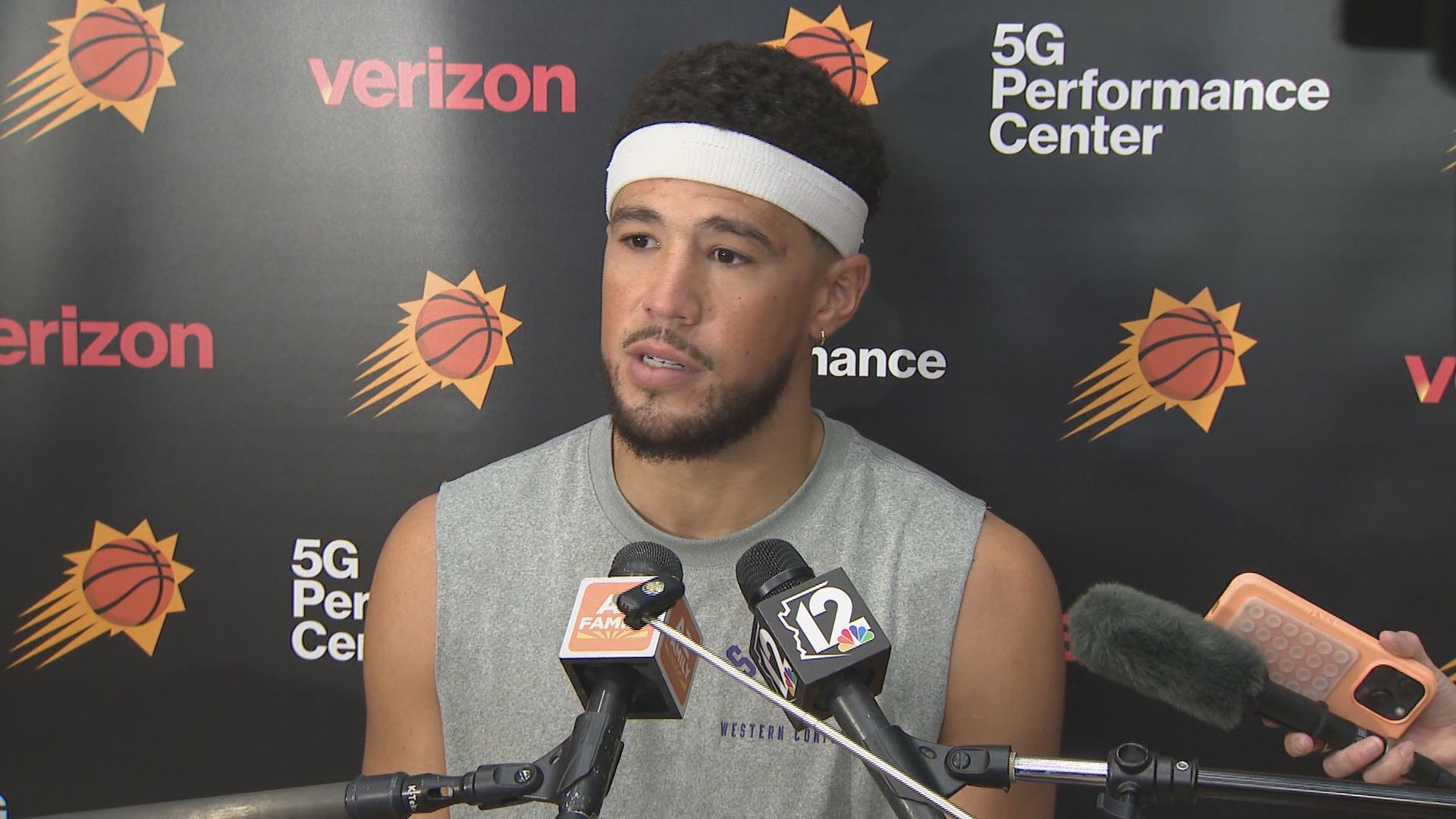 Suns guard Devin Booker talks with the media after practice about his ankle injury and going into year 10.