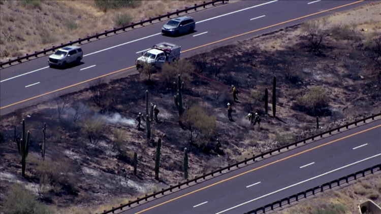 Brush fire burning along northbound State Route 87 north of
