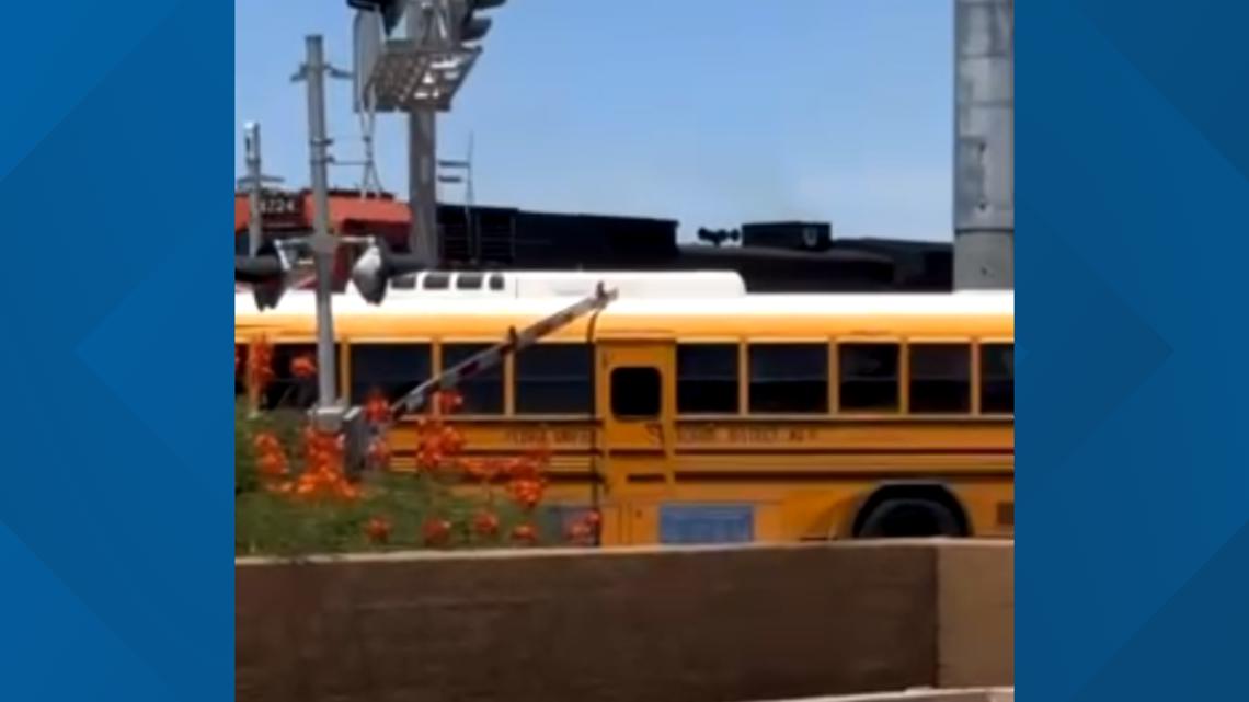 Peoria driver on leave after school bus full of kids gets stuck near train tracks