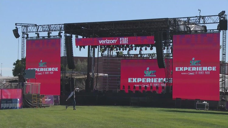 AU sports management and MBA students working NFL Experience event in  Arizona