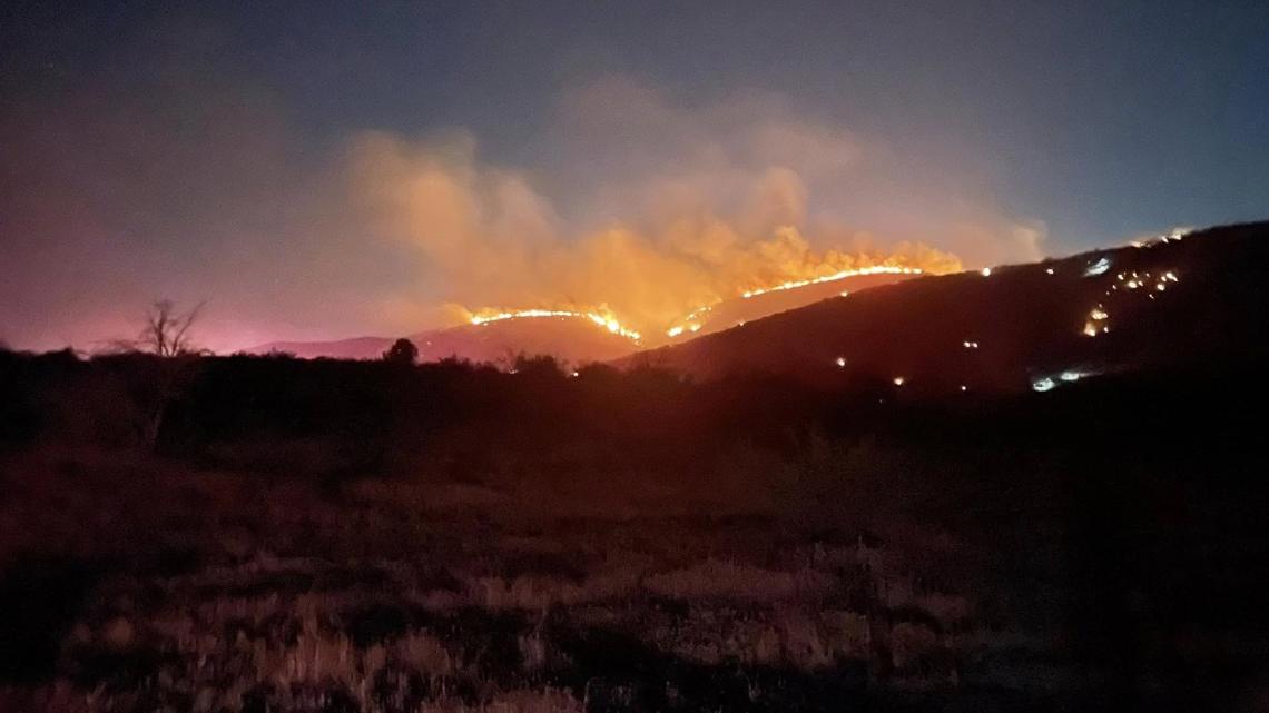 The fire is burning at a moderate to high rate of speed near the Bronco Trailhead.