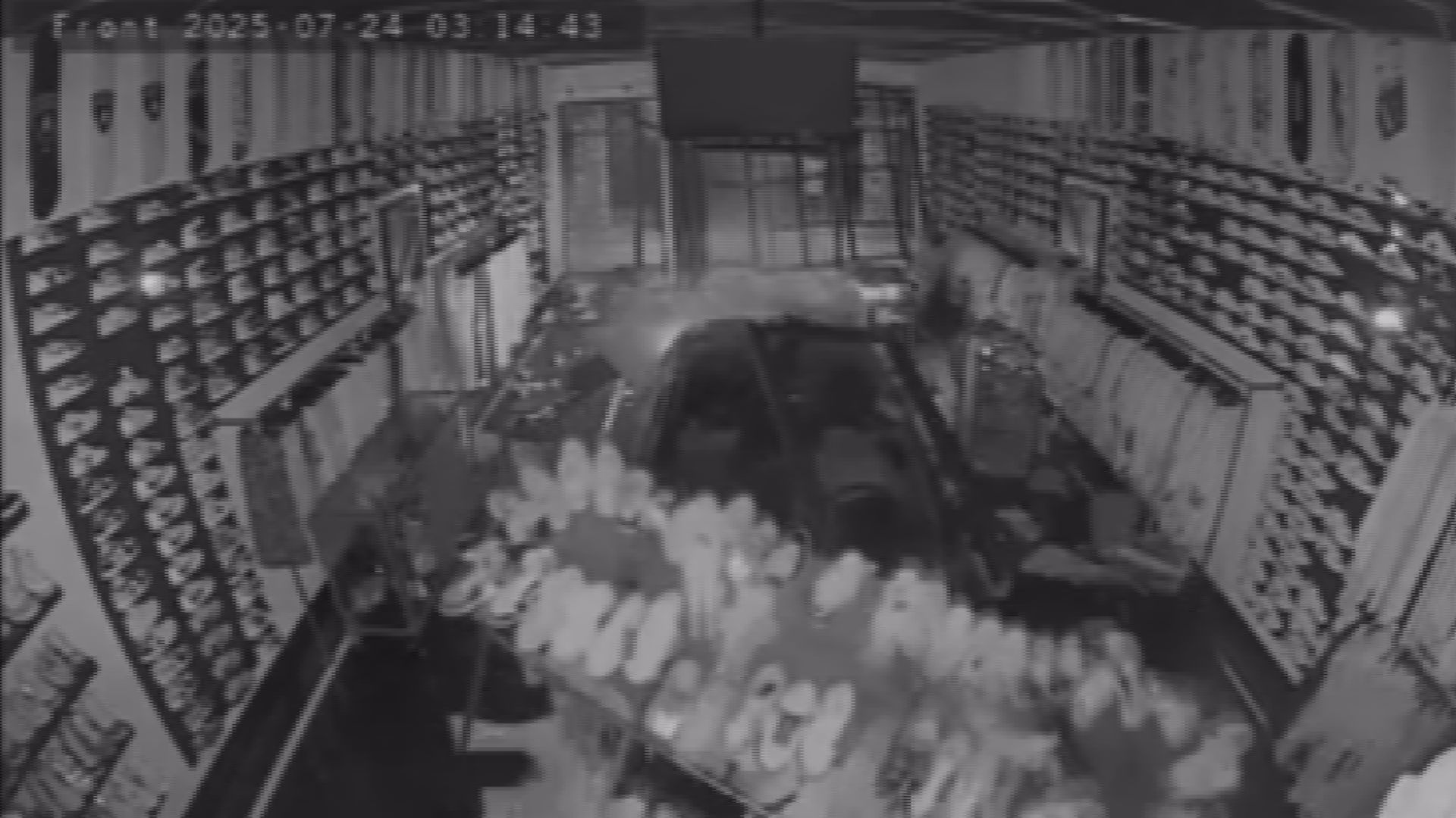Security footage from inside the store captured the frightening moment that the vehicle, which police said was reported as stolen, smashed through the front windows.