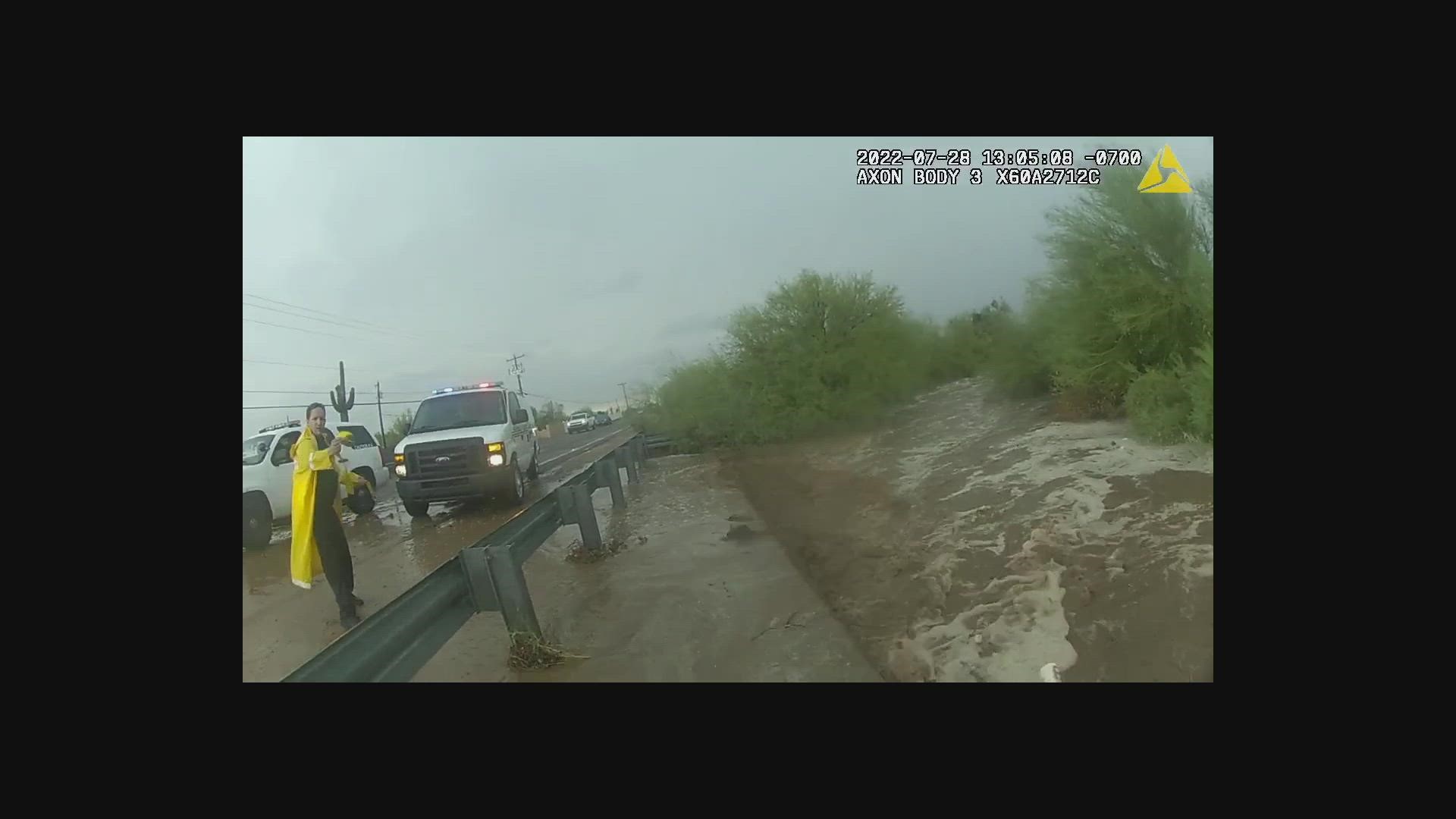Body camera video shows APJD officers rescuing a woman from her car in Weekes Wash Thursday, July 28.