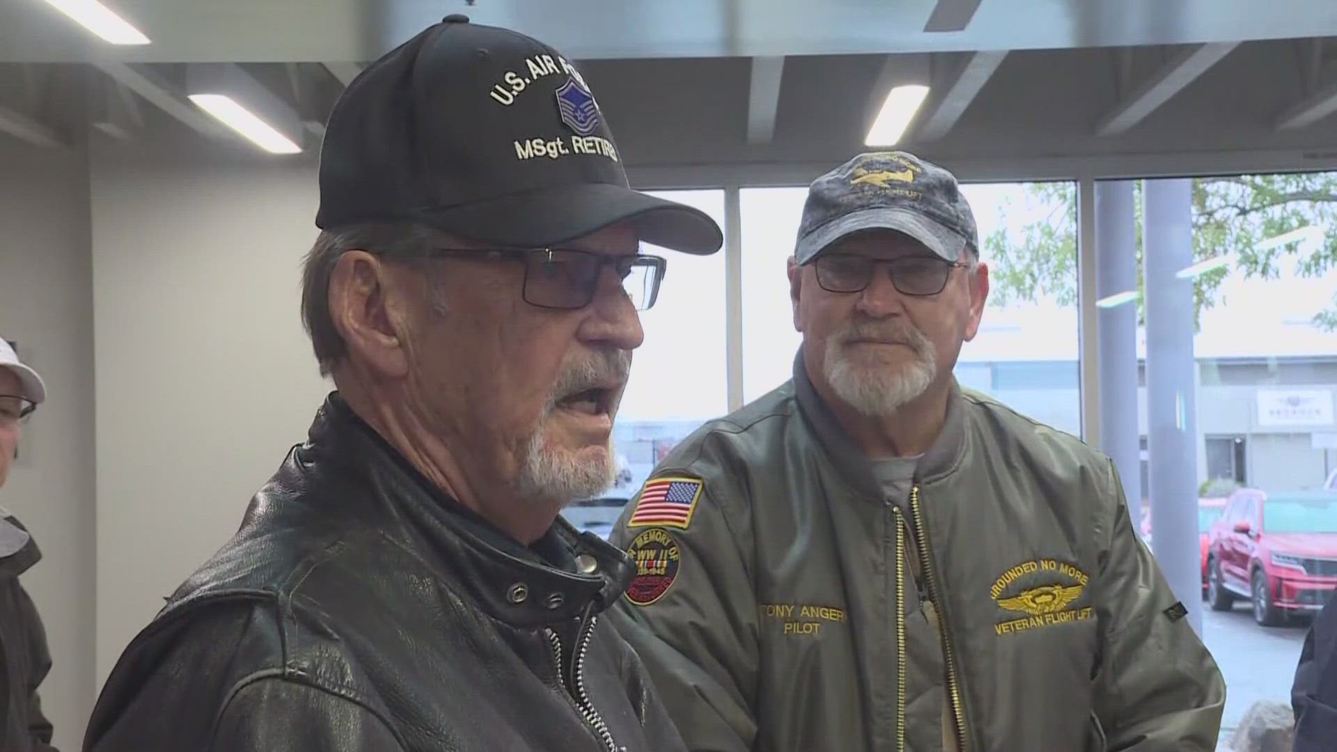 Terrance Schroeder and Hal Bergdahl are the honored veterans and honor flight recipients.