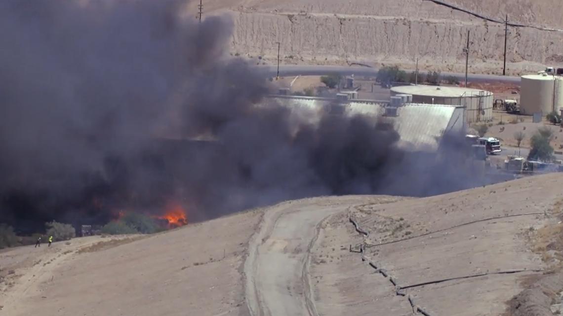 Surprise recycling plant fire burns for second day, officials say