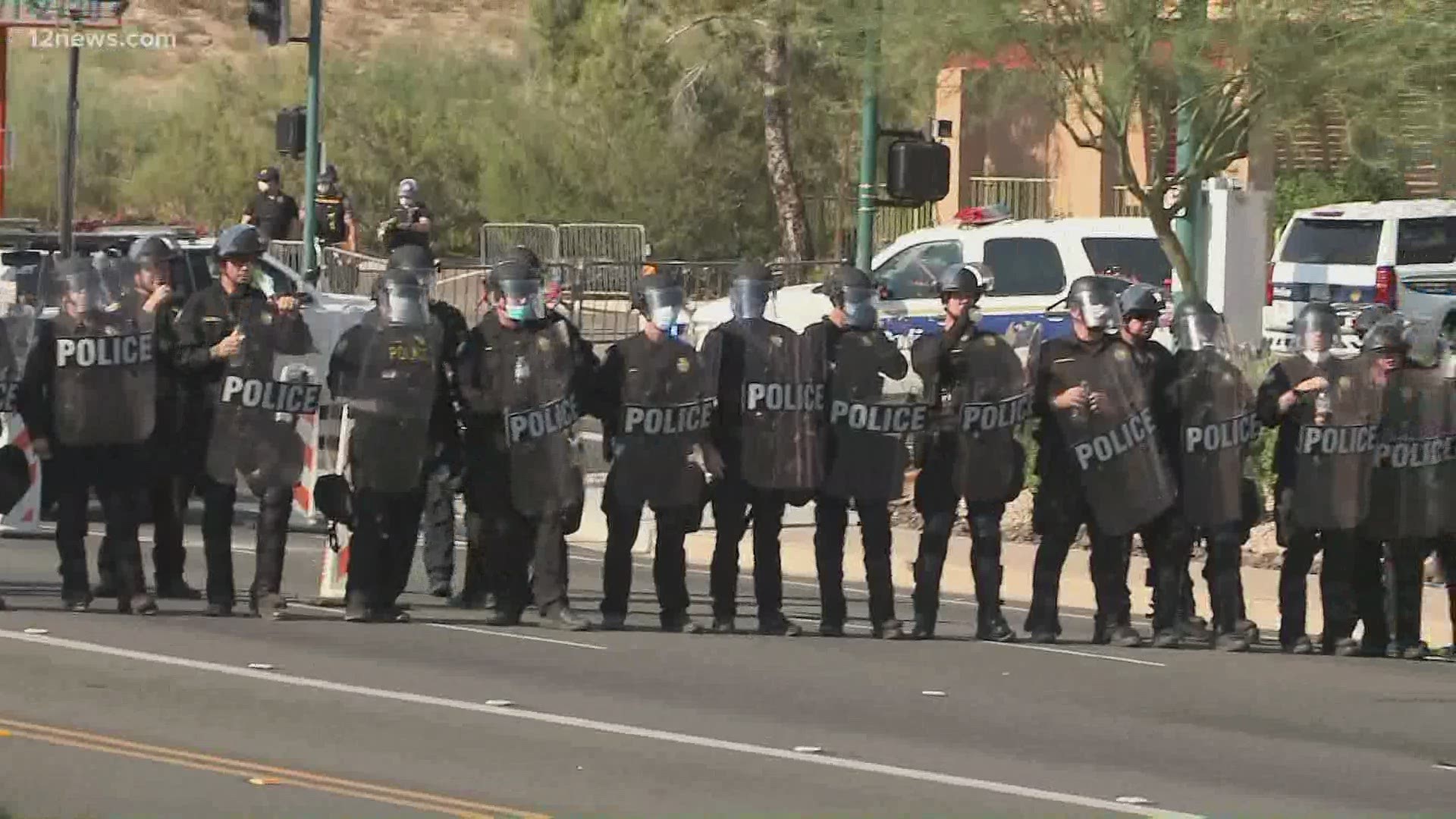 Phoenix police have declared a protest outside the Trump rally an unlawful assembly. 12 News reporter Micahel Doudna heard flashbangs before the declaration was made