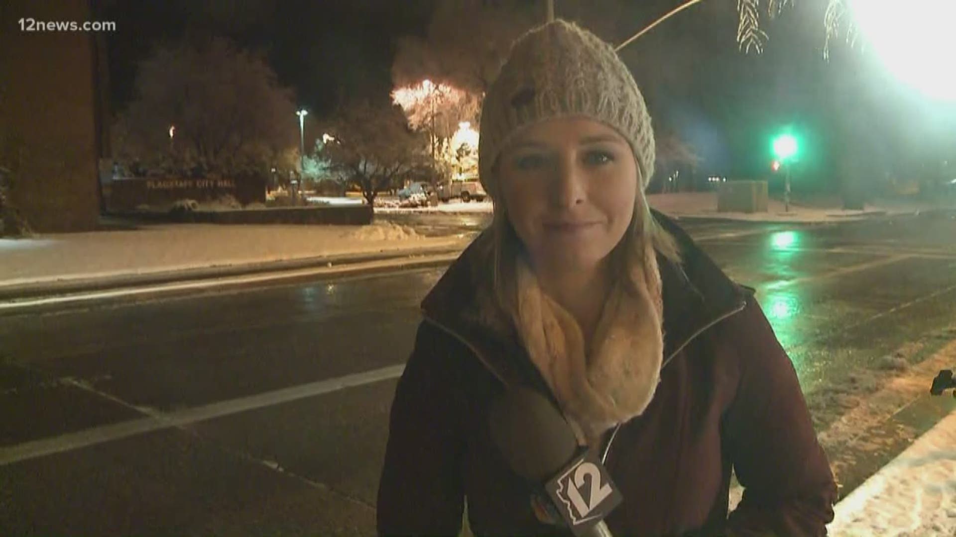 Team 12's Colleen Sikora hangs out in a snowy Flagstaff after a few inches of snow fell overnight.