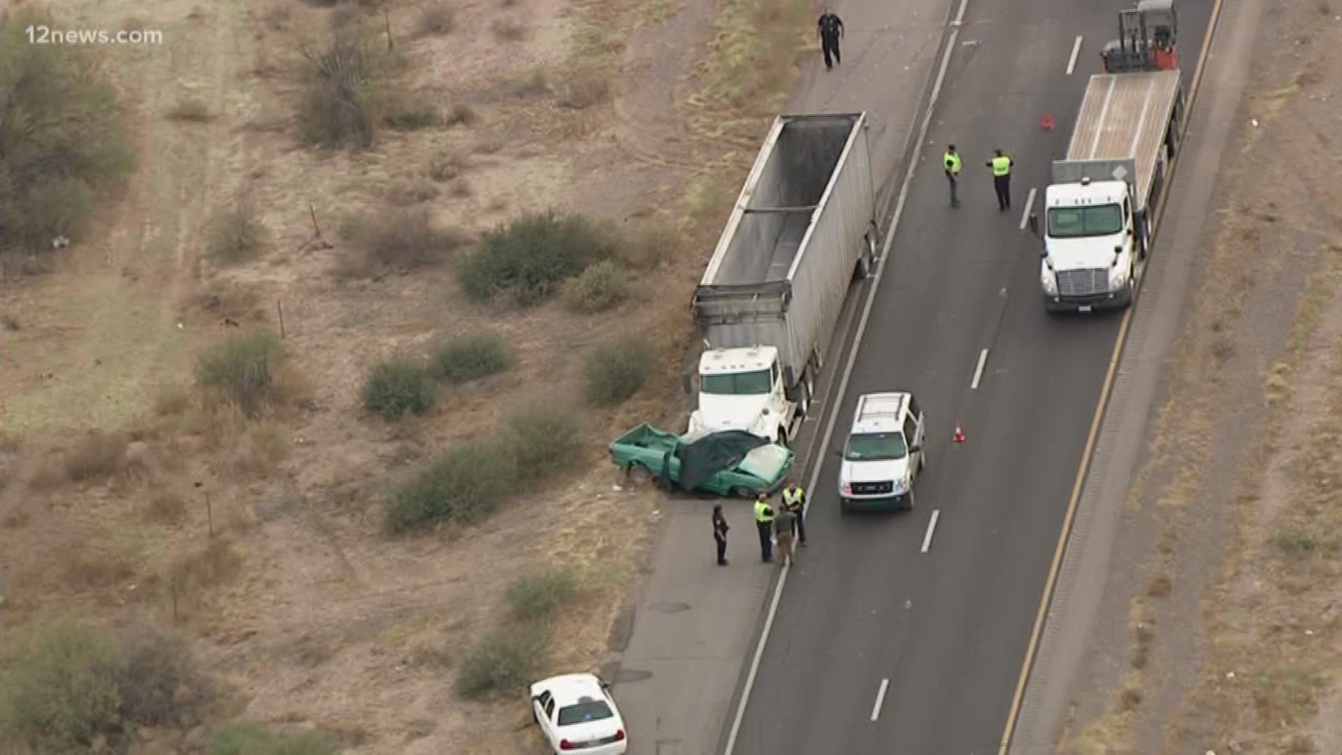 Officials said a pickup truck swerved across the median and hit by an oncoming semi-truck killing three people on SR 347 near Maricopa.