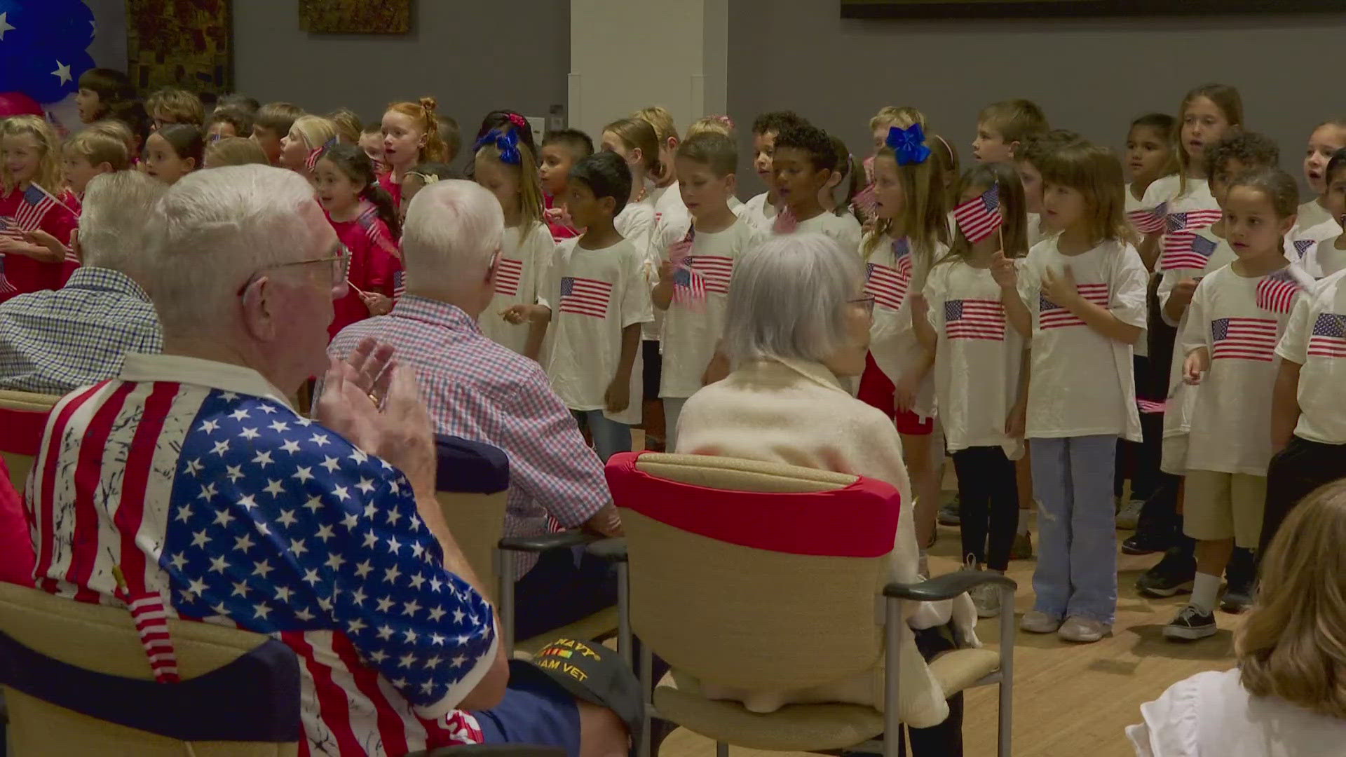 Valley children say thank you to those who served with the gift of song.