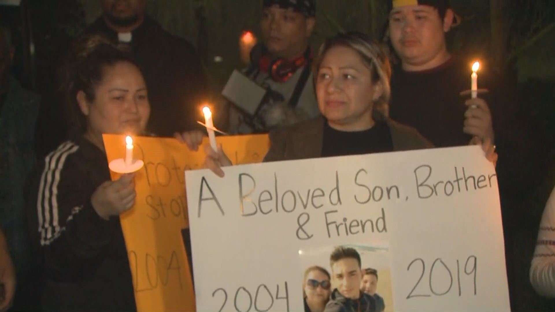 A crowd of people showed up outside Tempe police headquarters Thursday night to protest the shooting death of a 14-year-old burglary suspect Tuesday afternoon.