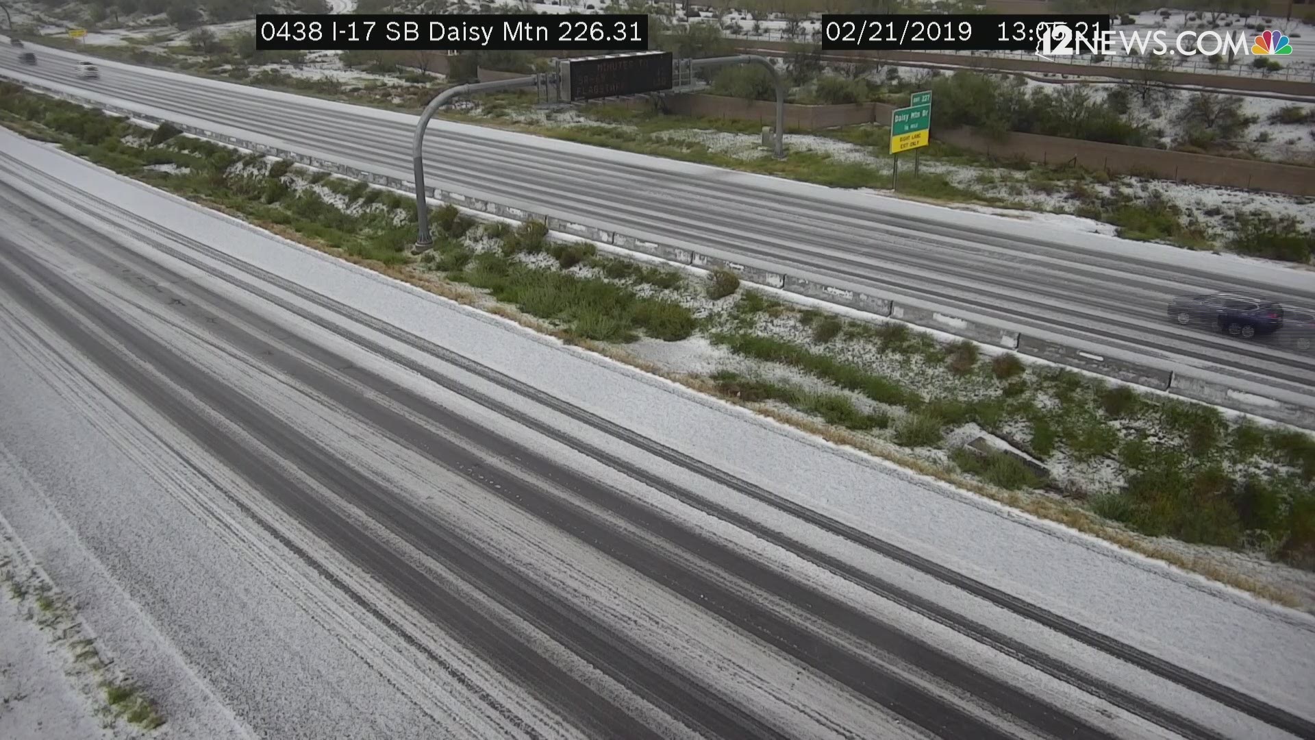 Is that snow on I-17 at Daisy Mountain? Sorry, no! But it is graupel. Watch a time lapse of cars driving through it.