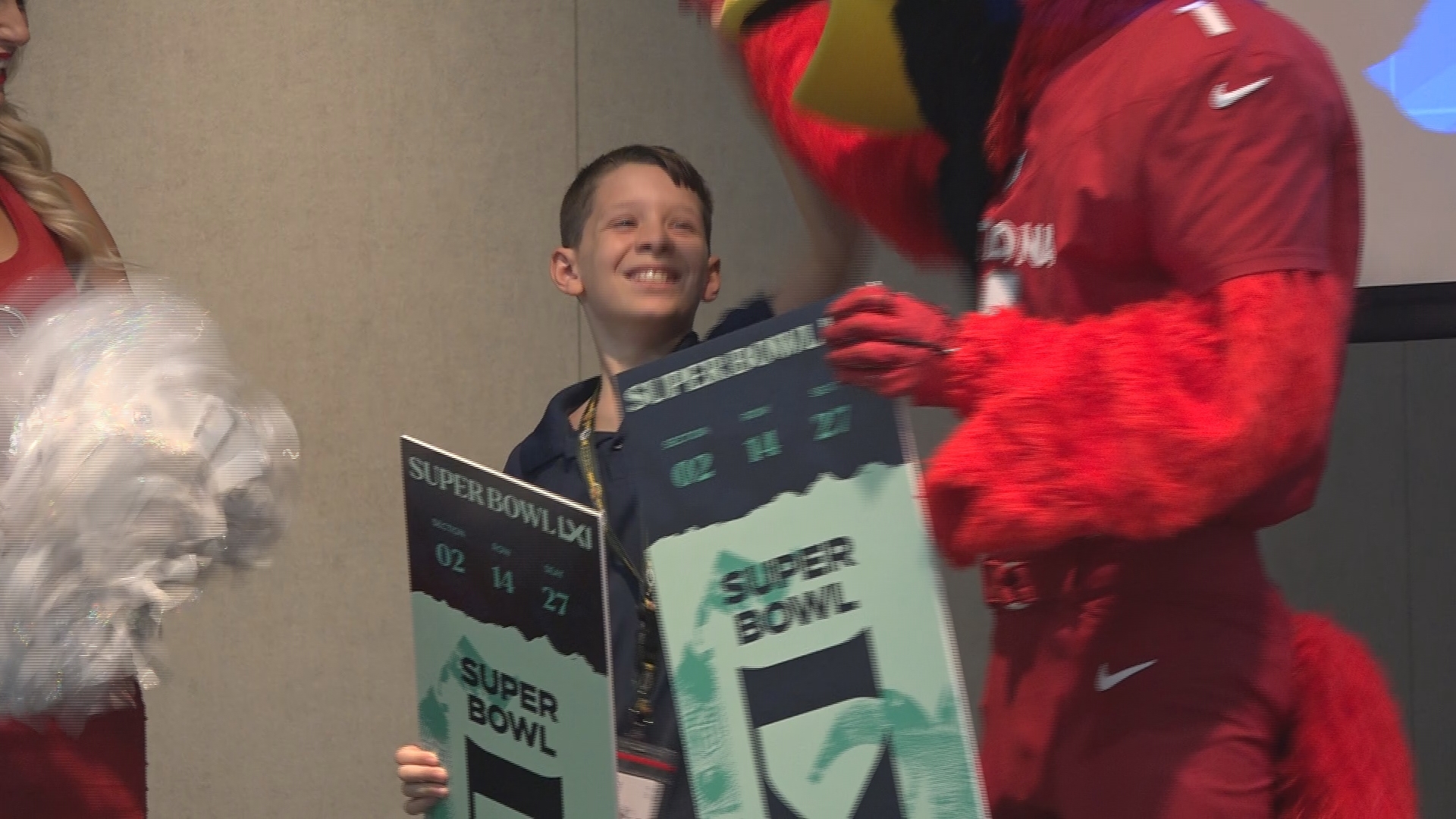 Mesa sixth grader surprised with Super Bowl tickets at school assembly