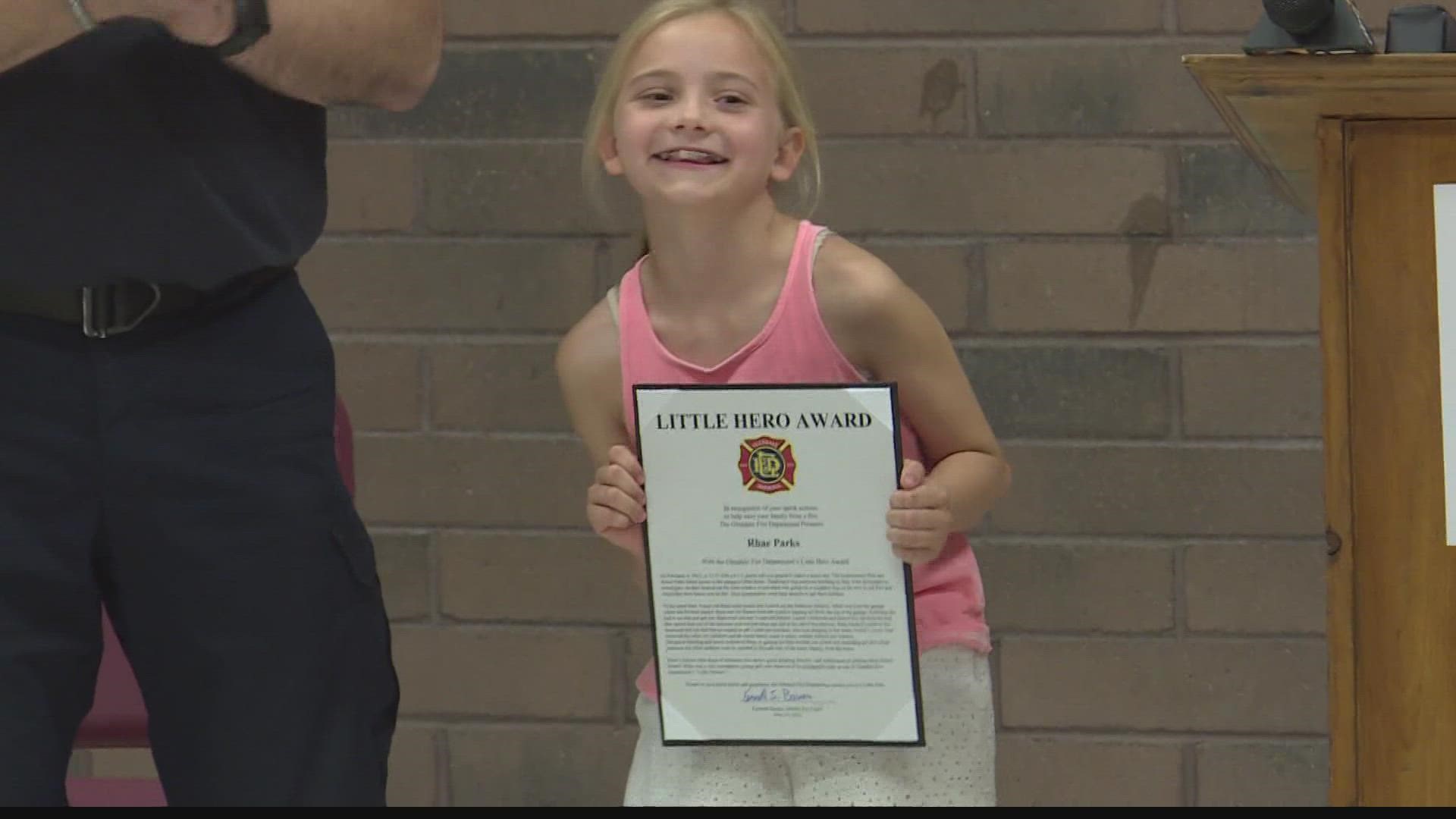 9-year-old Rhae Parks was honored with the Little Hero Award by the Glendale Fire Department for her bravery. She saved her little brother from a house fire.