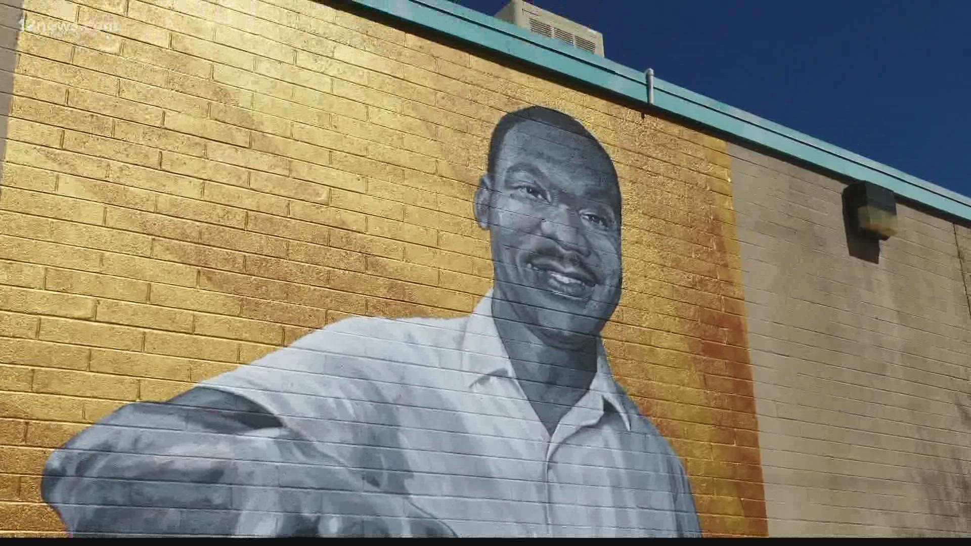 The murals are places where vibrant colors meet historical figures such as Jackie Robinson and Rosa Parks. The project seeks to link past struggles with today.