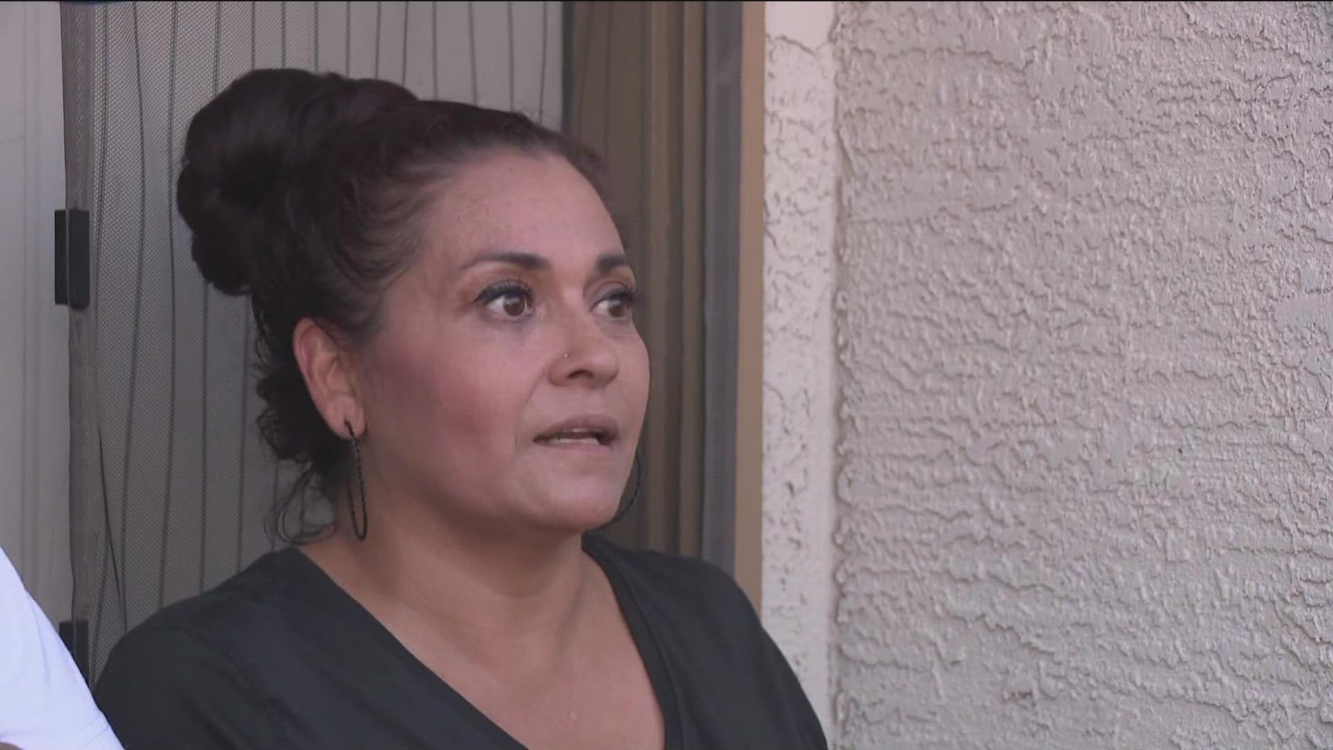 A woman recounts a scuffle between police and parents during lockdown at an El Mirage elementary school.