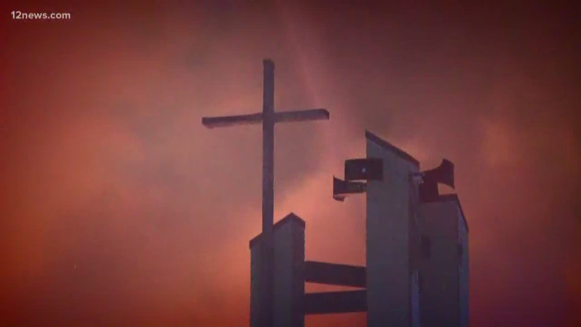 Hundreds worshiped at St. Joseph's, despite last week's devastating fire.