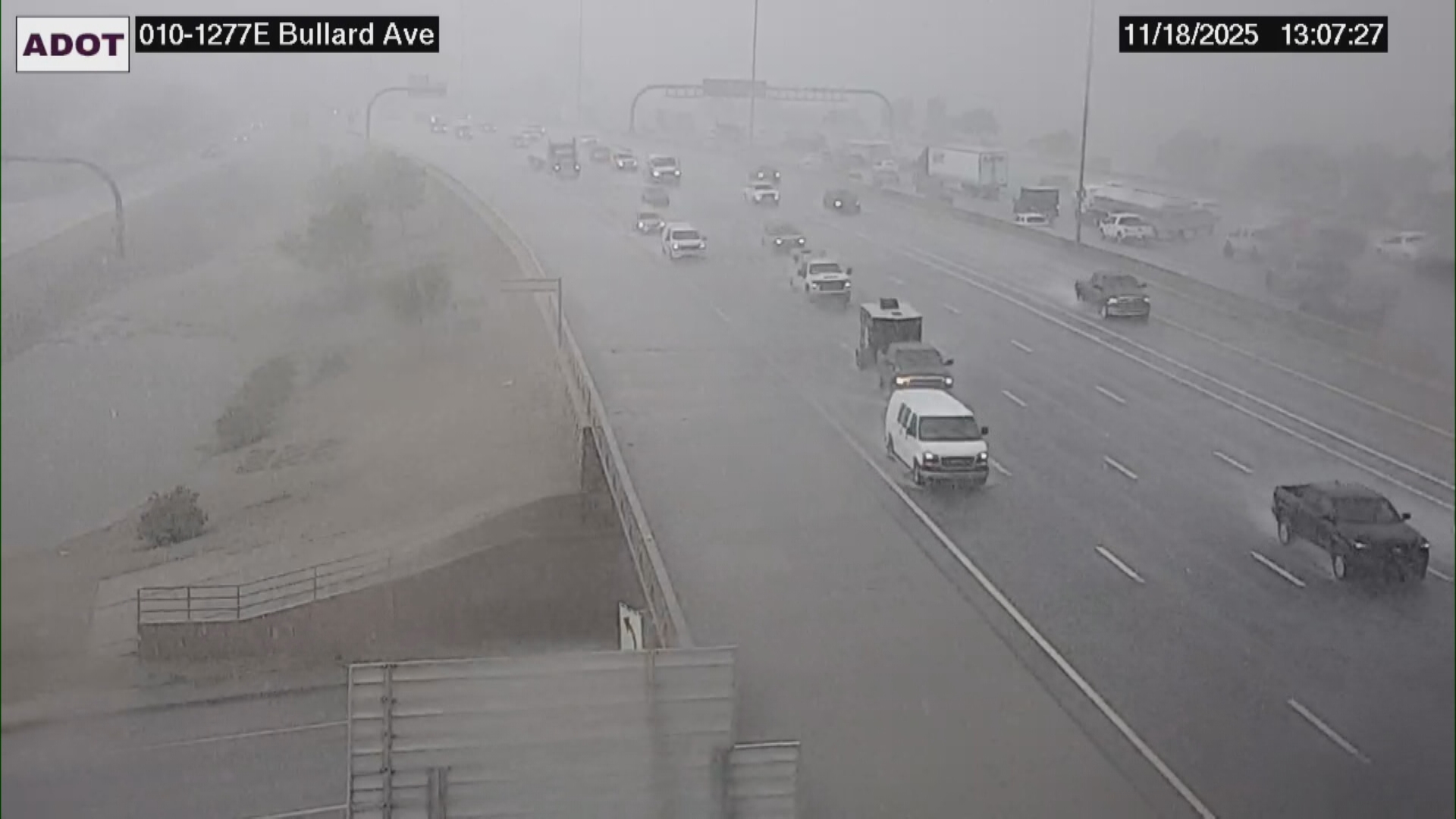 Rain can be seen drenching the road on Interstate 10 near Bullard Avenue on Nov. 18.