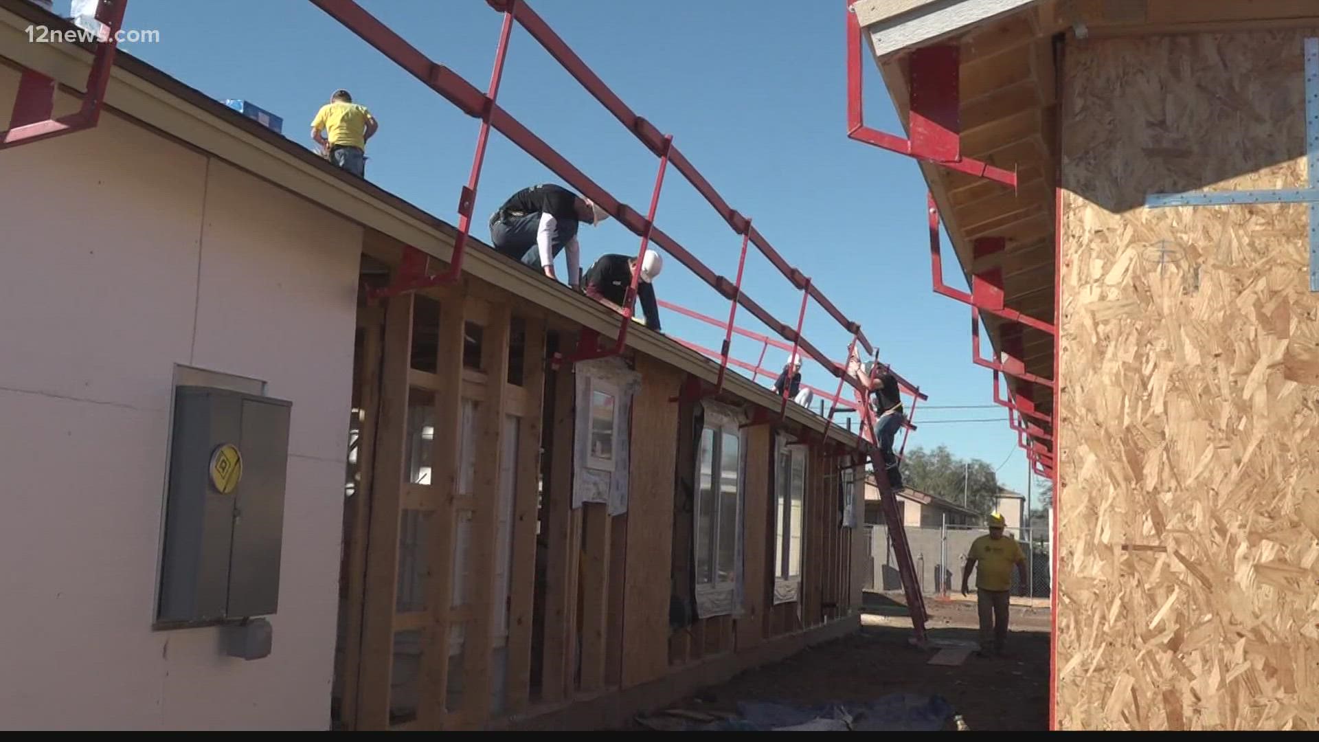 Phoenix Marines spent their Saturday morning and afternoon helping those in need by teaming up with Habitat for Humanity to build homes.
