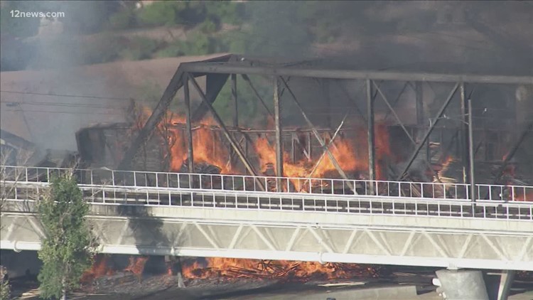 Hazmat situation declared at train fire on bridge over Tempe Lake
