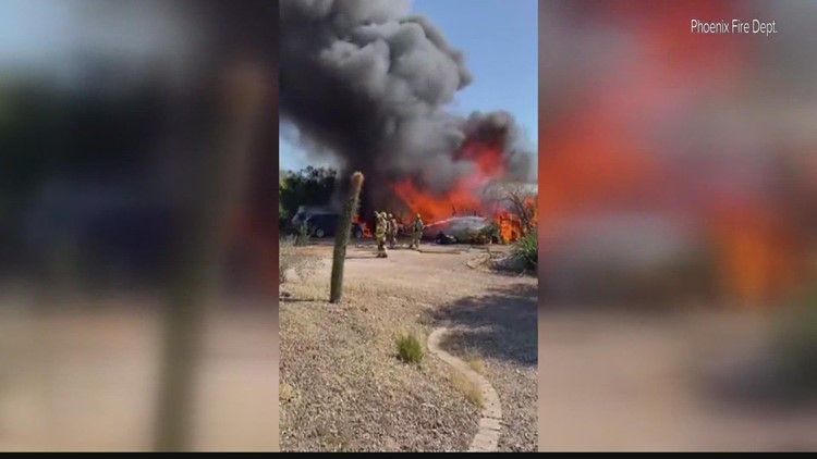 Phoenix house fire injures 2 people, kills 5 dogs
