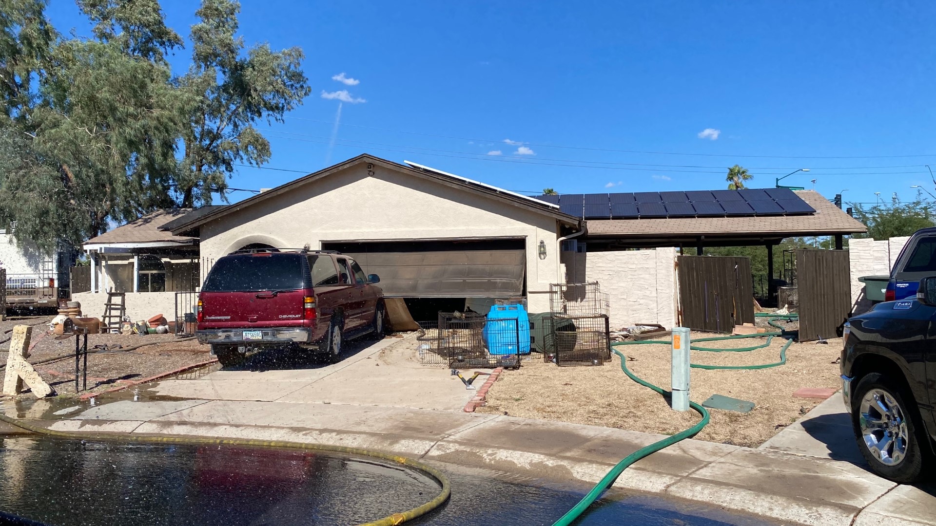 The fire started at a house in the area of 39th Avenue and Bell Road shortly before 1 p.m. on Saturday.