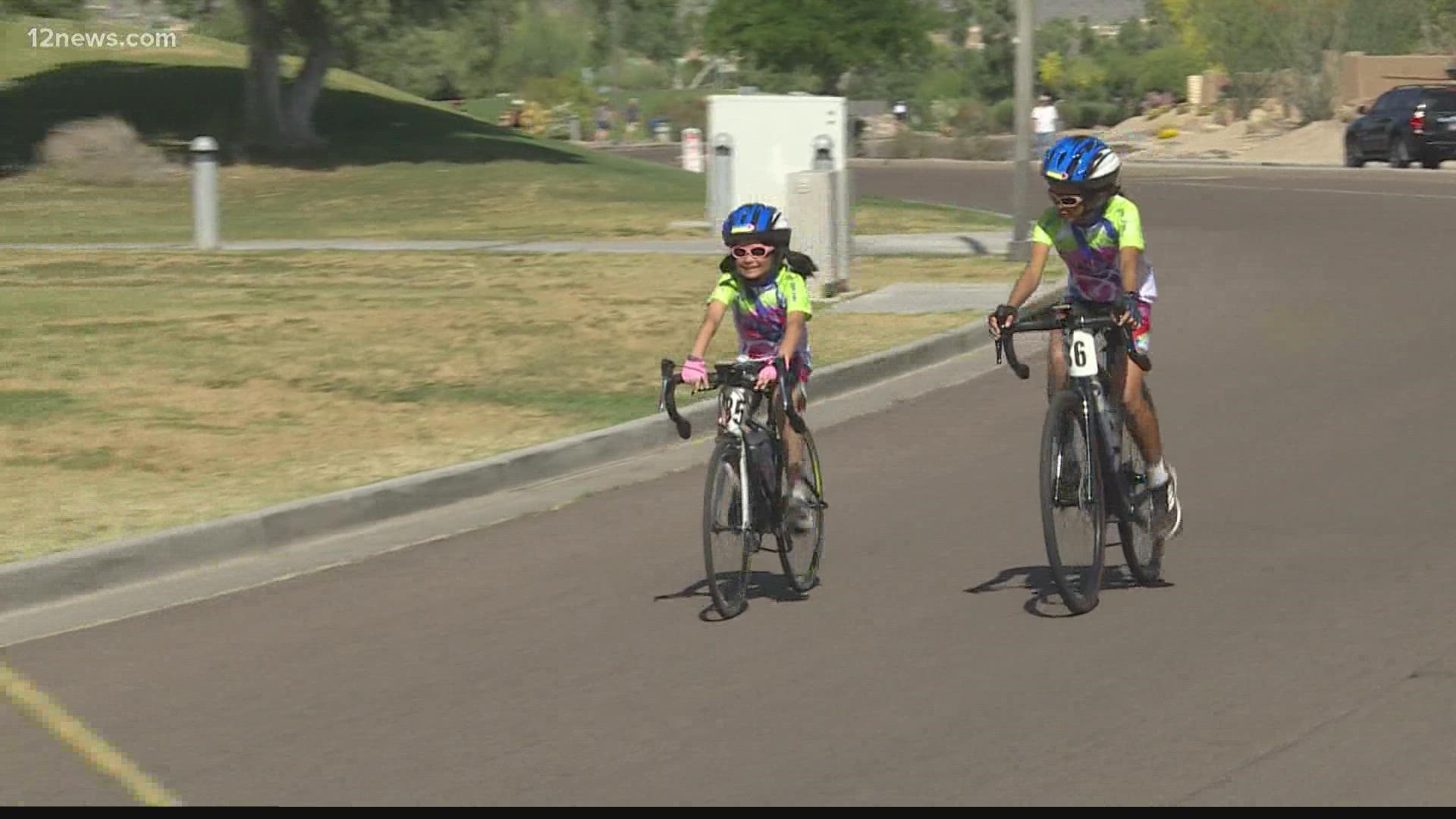 Two young girls biked in a Valley event all for one mother who was killed while riding home on her bicycle in Ukraine.