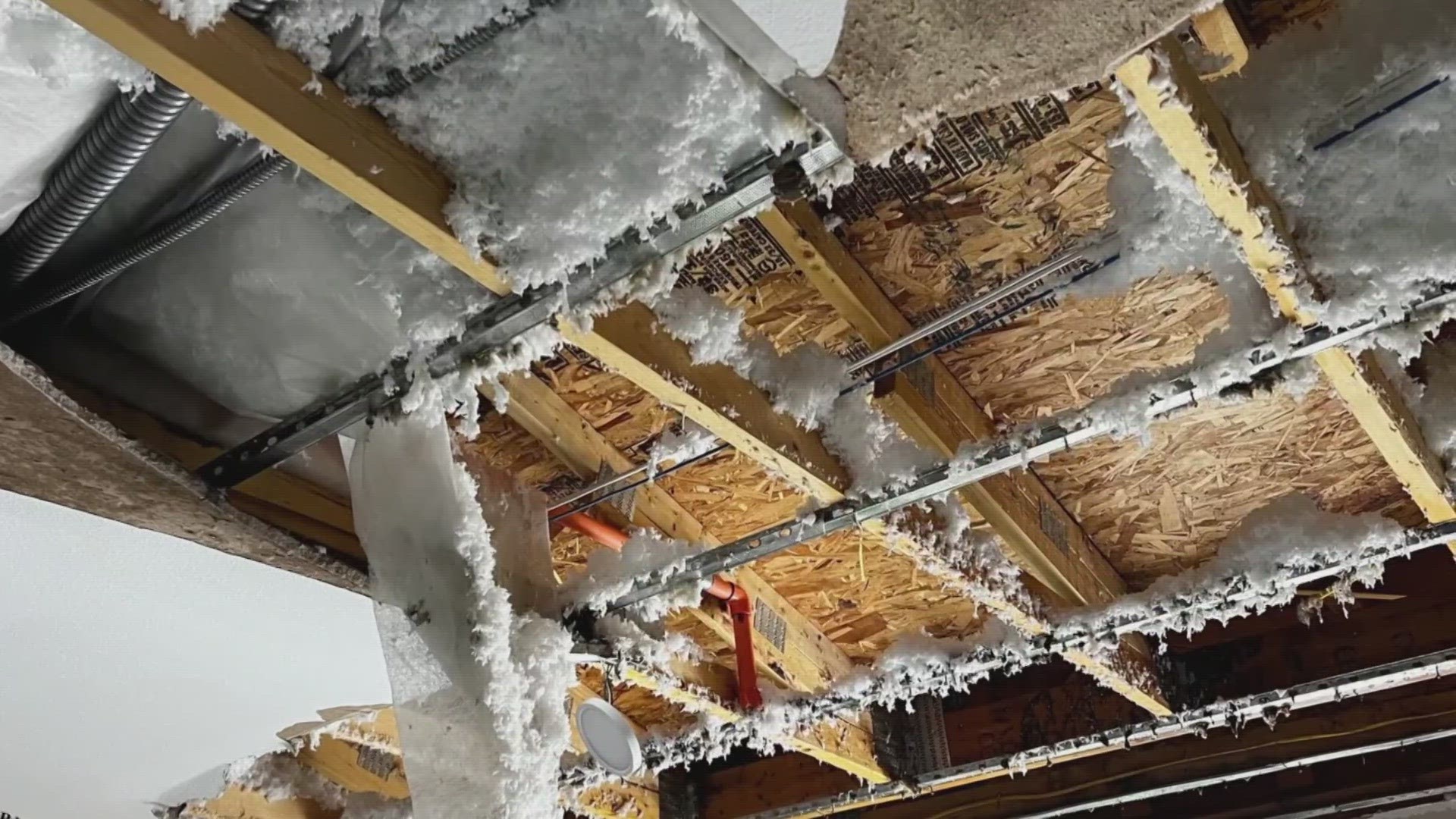 A frozen sprinkler line led to a water leak, resulting in collapsed drywall on the third floor of a building and significant damage to all three floors.