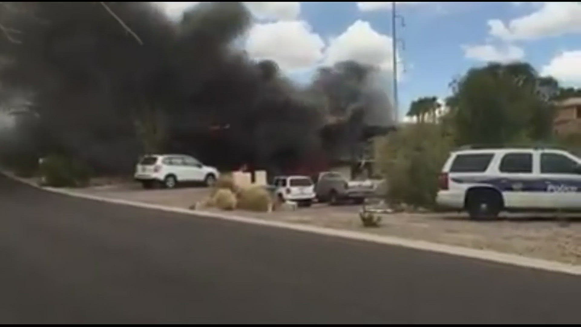 A house fire near 11th St. and Peoria Ave. is causing ammo to go off. Video: David M. Armstrong?