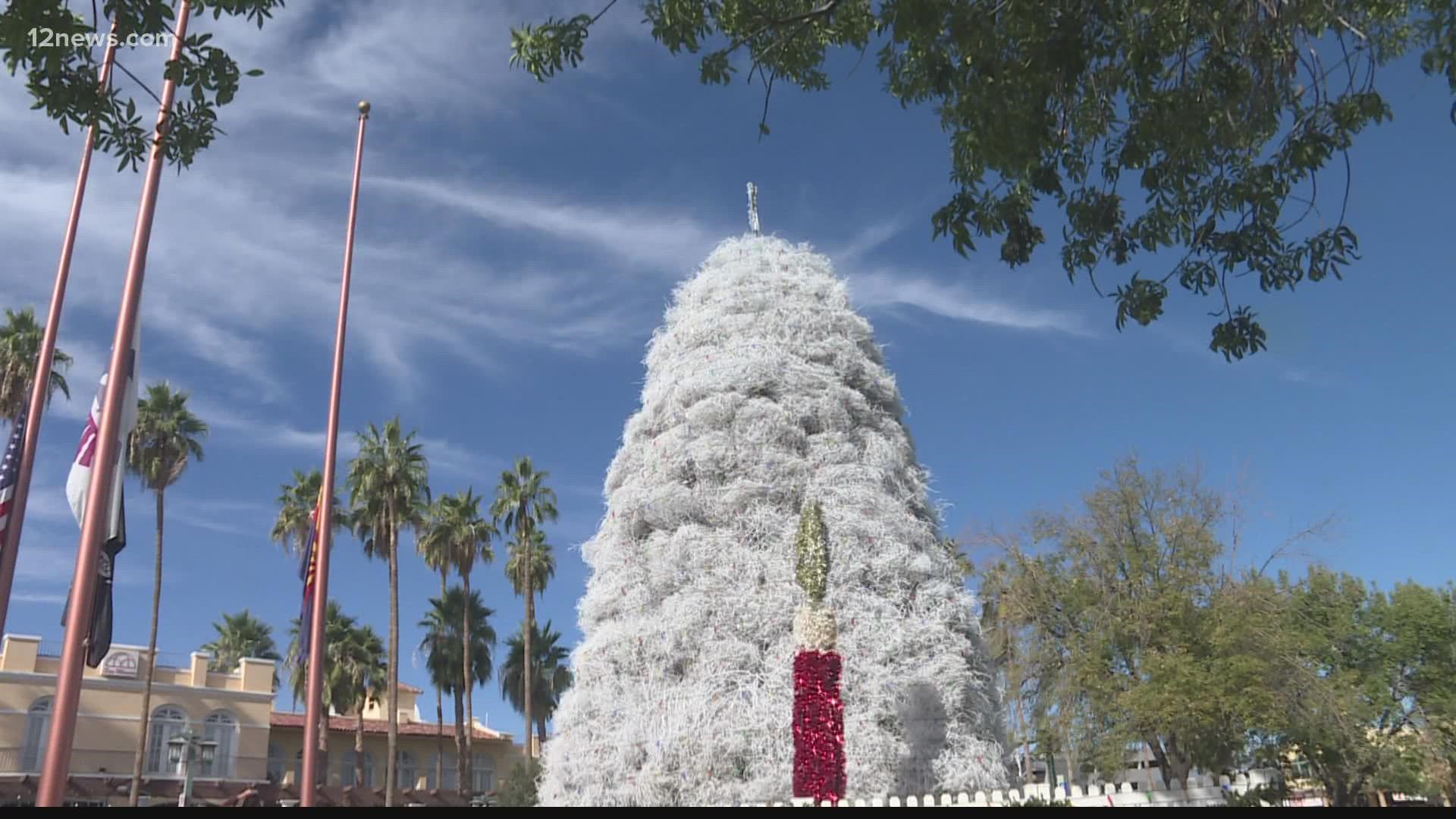 While taking a stroll in downtown Chandler, you can see crews putting the finishing touches on a 35-foot-tall Christmas tree unlike any other!