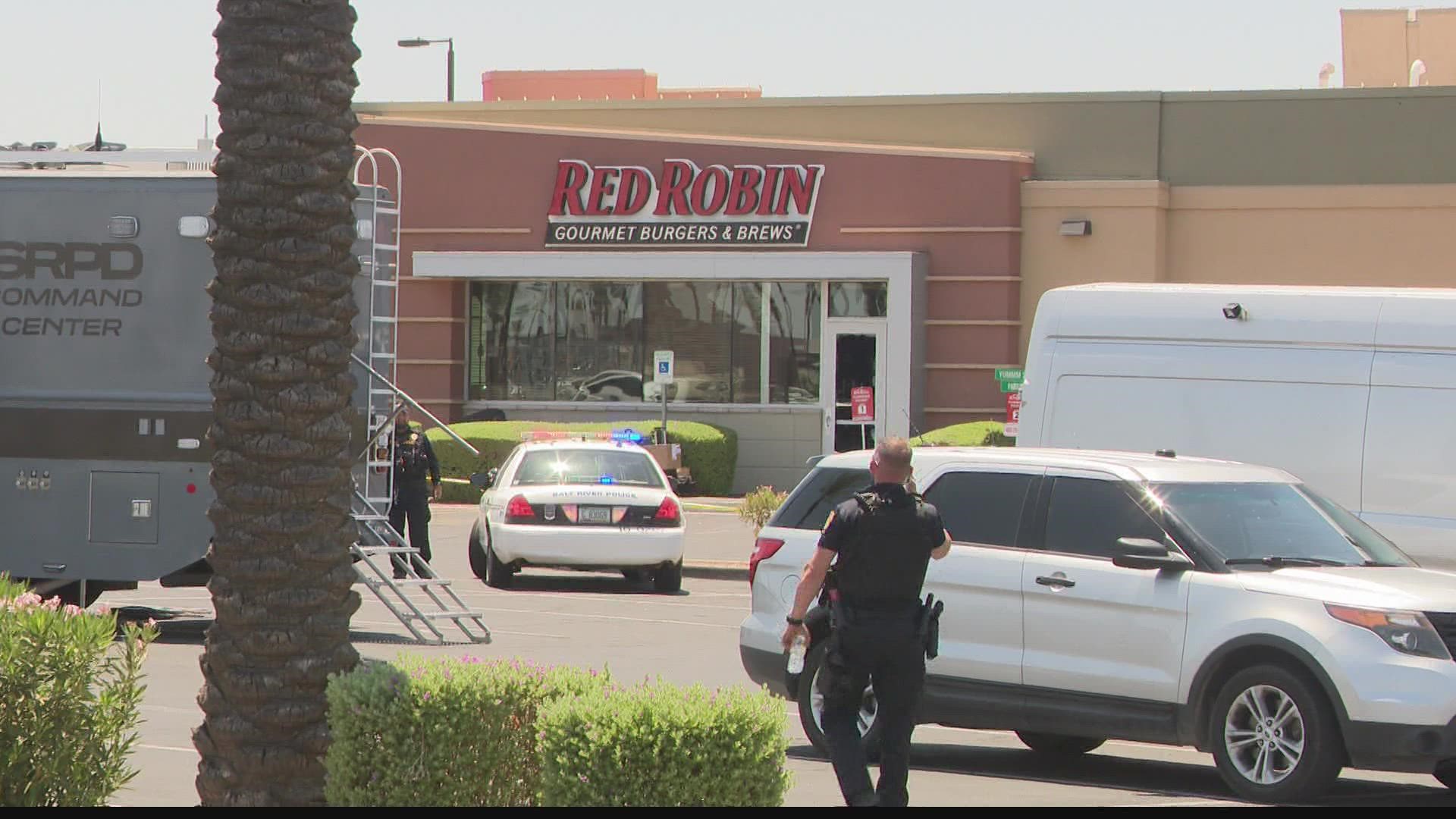 Authorities are investigating after a dead body was found inside a Red Robin Restaurant in Scottsdale Sunday morning.
