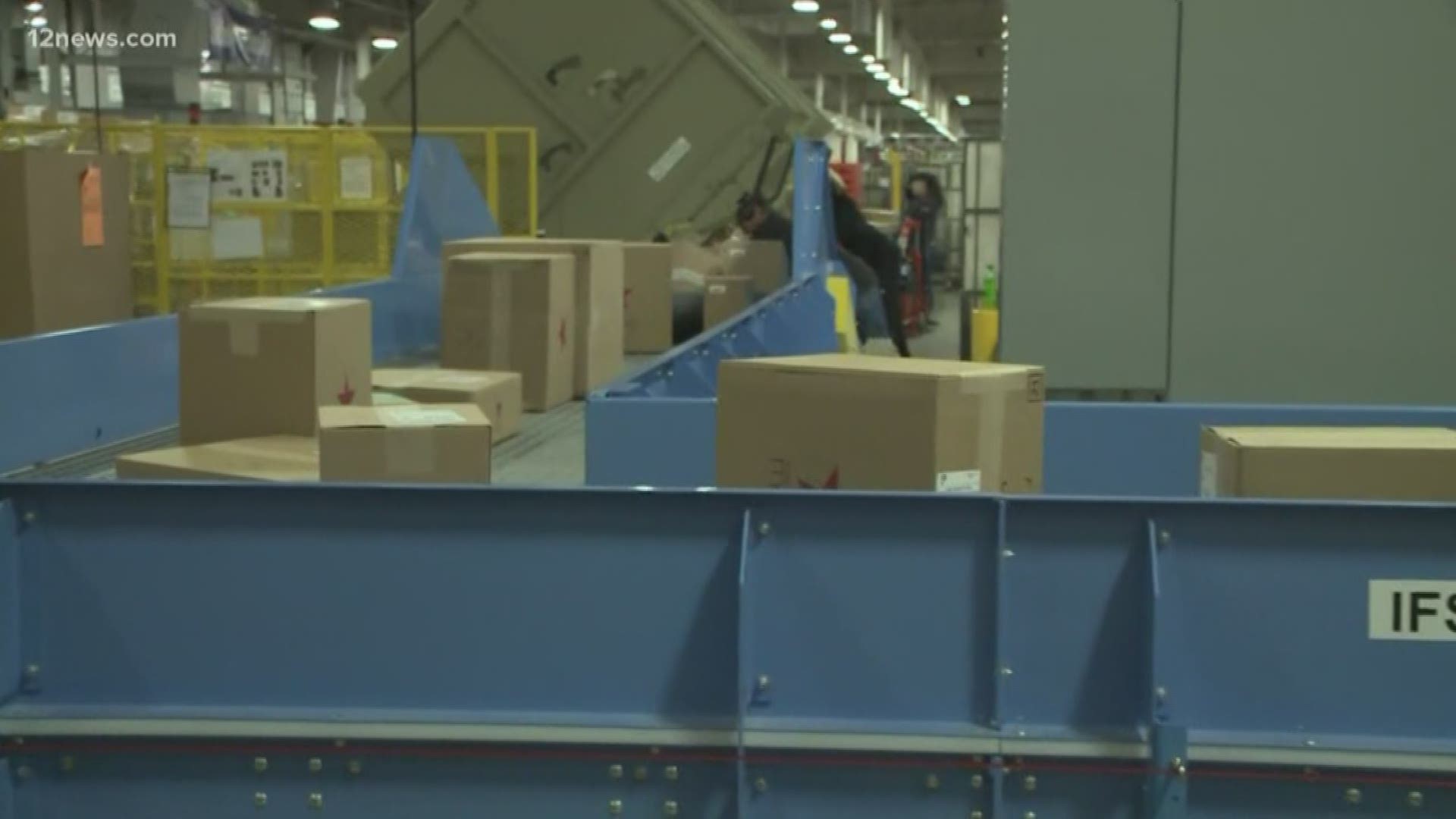 Next week is the busiest time of the year for the USPS. We give you a behind the scenes look at a USPS processing center just before the center is expected to go into overdrive.