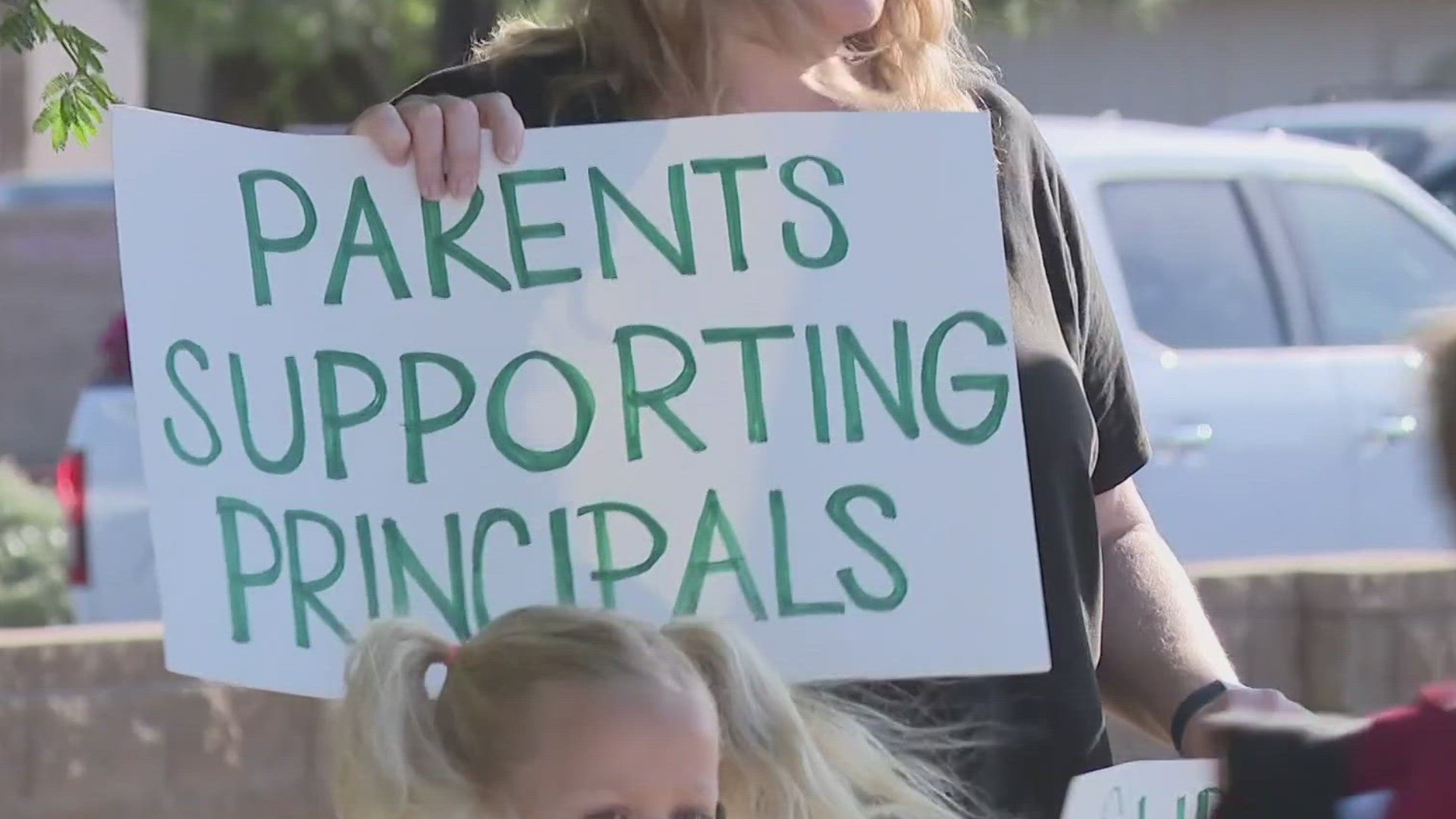 Students and parents protested outside of Benchmark Elementary and Pre-School on Monday to protest the firing of their two principals.