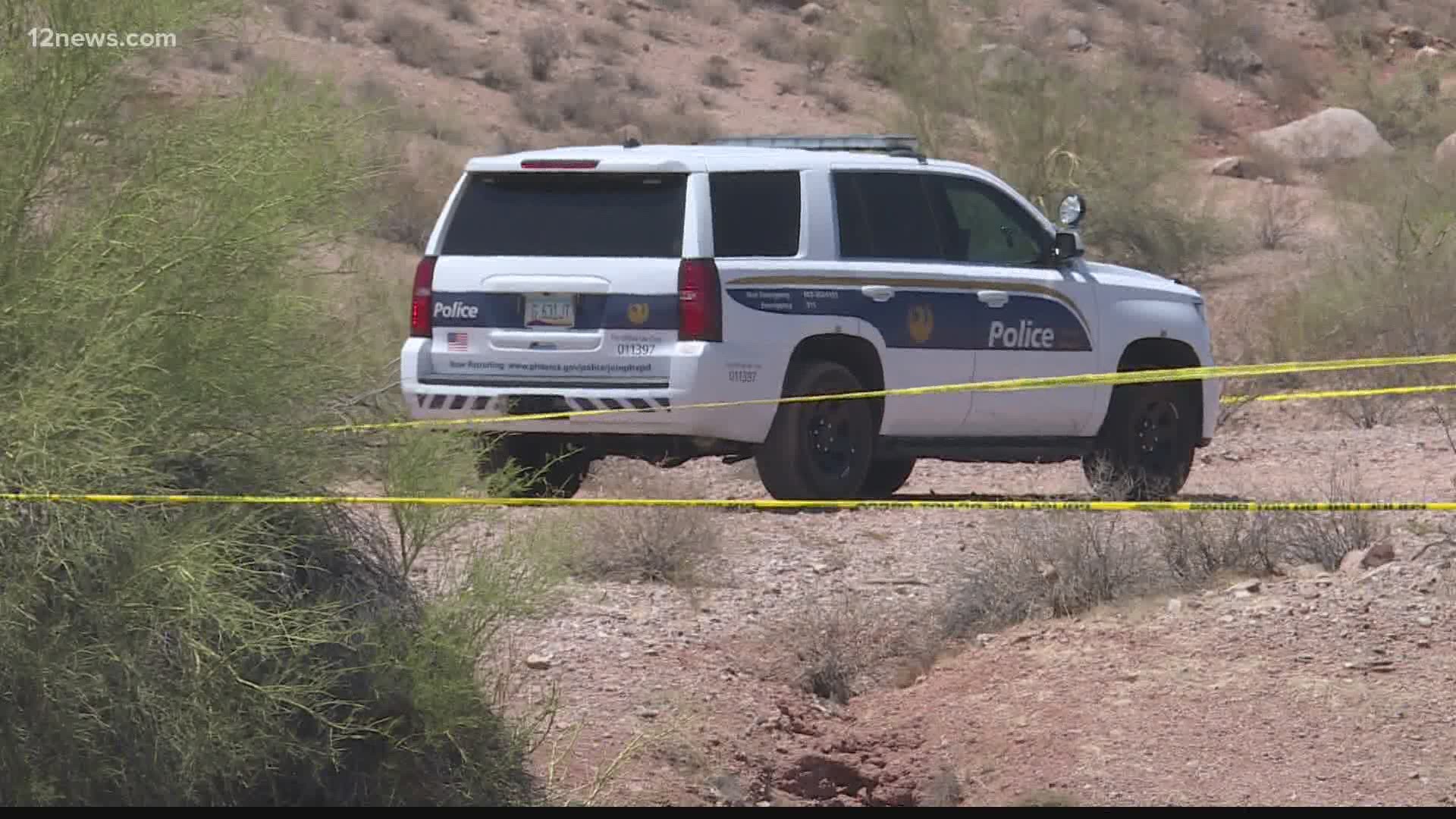 The dead body was located on a nearby trail, police said. When detectives arrived on the scene, officials said they noticed blunt force trauma on the victim.