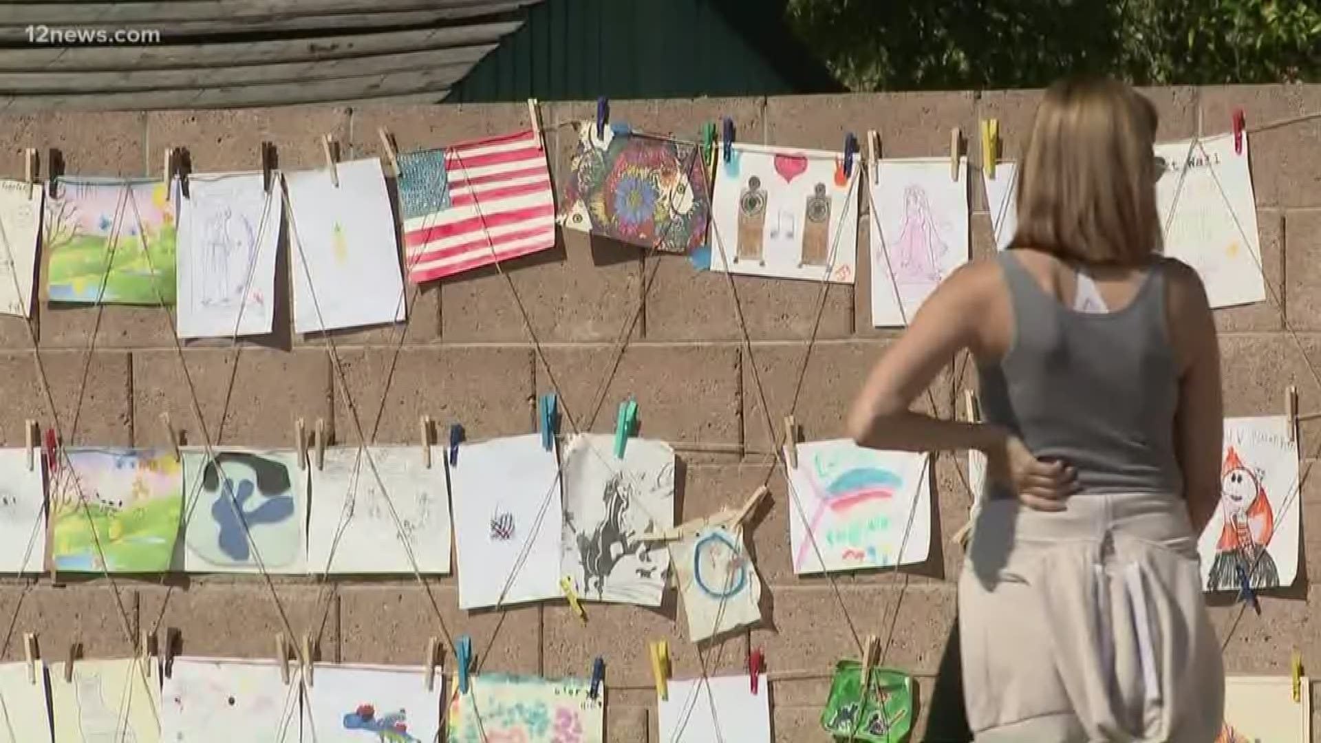 A Mesa girl is bringing her neighborhood together through art. She started putting up her own art on a wall and posted a sign saying her neighbors should do the same