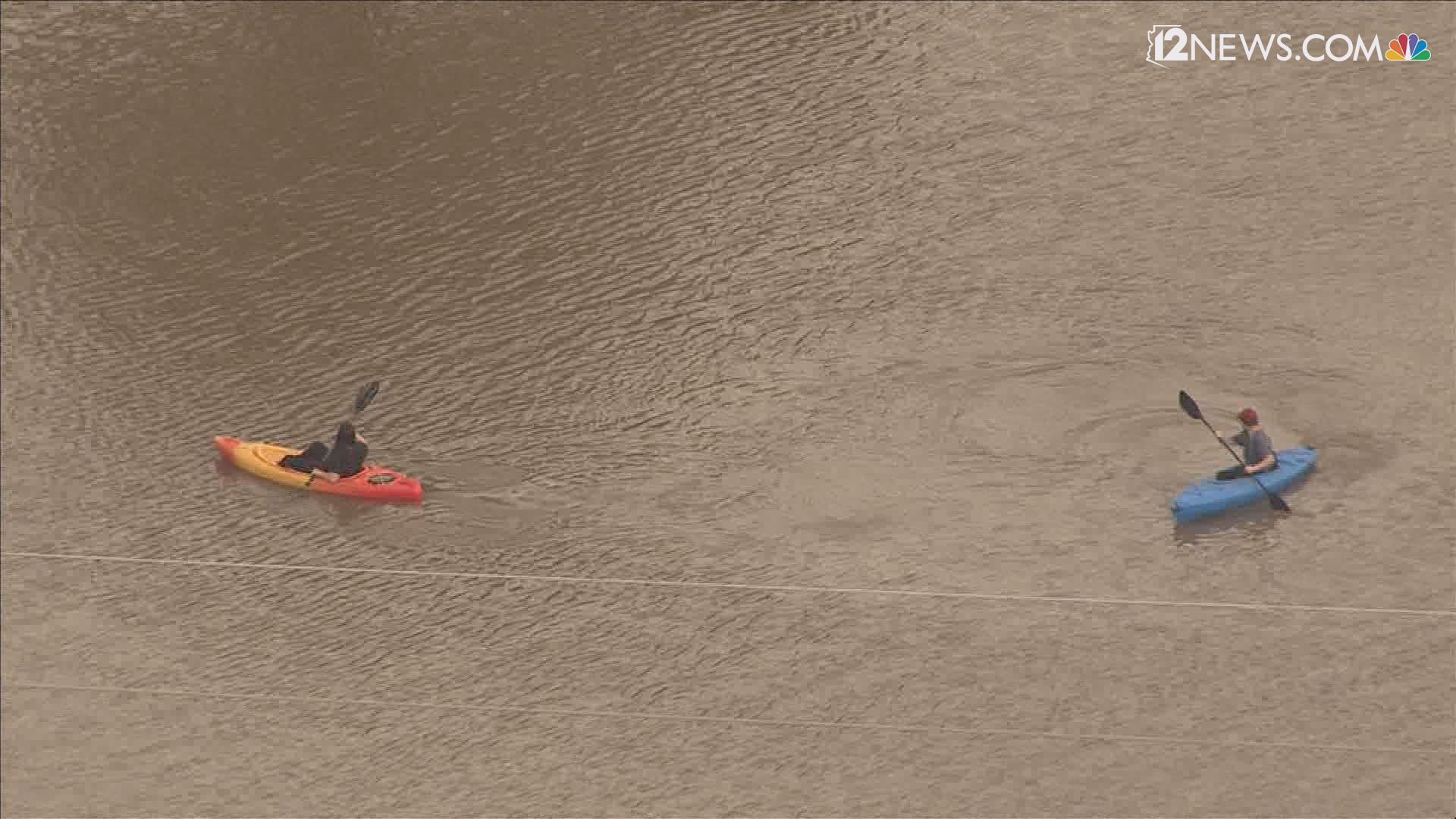 Sky 12 captured people kayaking through floodwaters Monday morning. The storm is not a monsoon storm but an offshoot of a tropical storm.