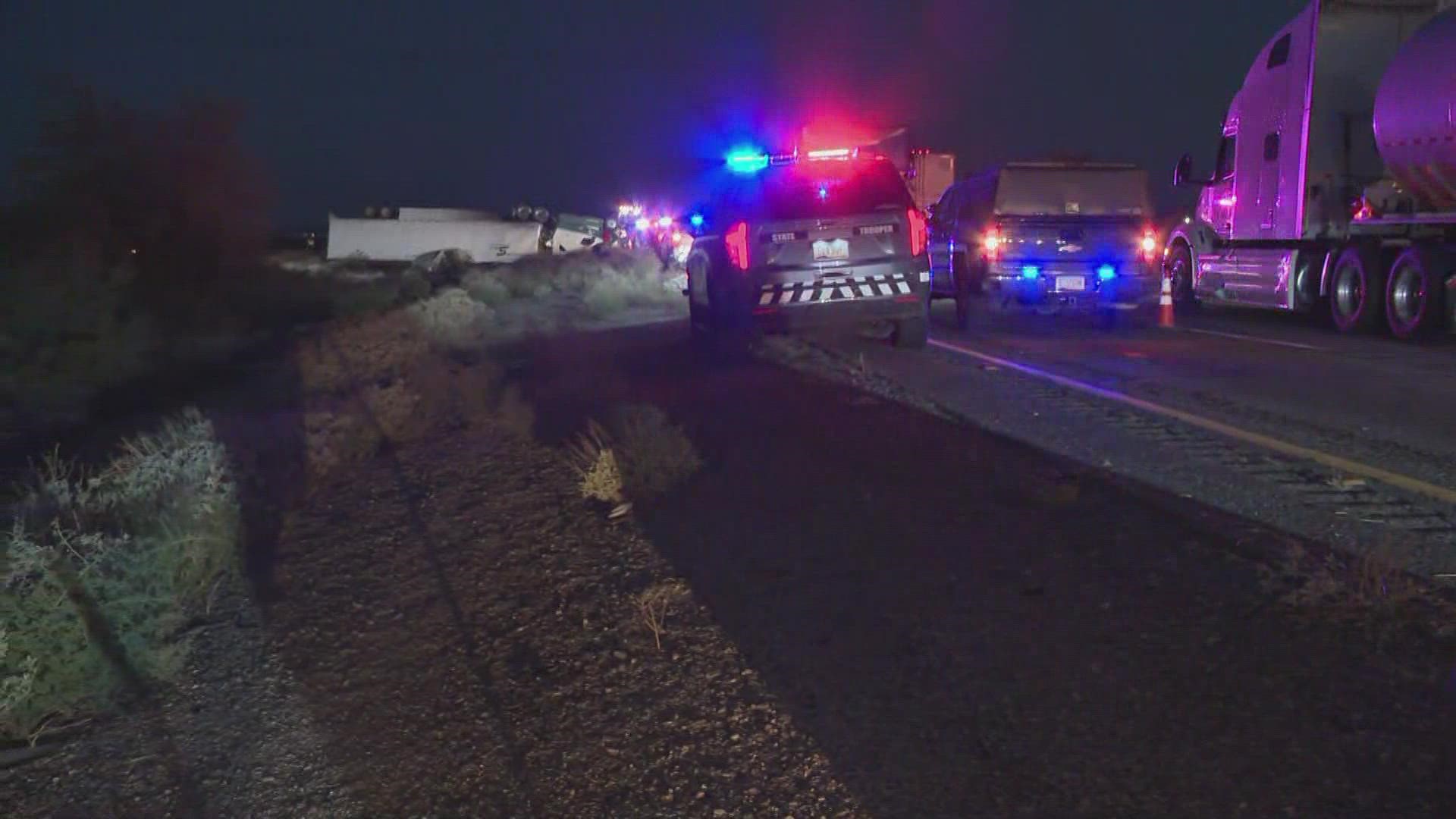 One person is dead and three others are in the hospital after a semi-truck crash early Thursday morning, the Arizona Department of Public Safety said.