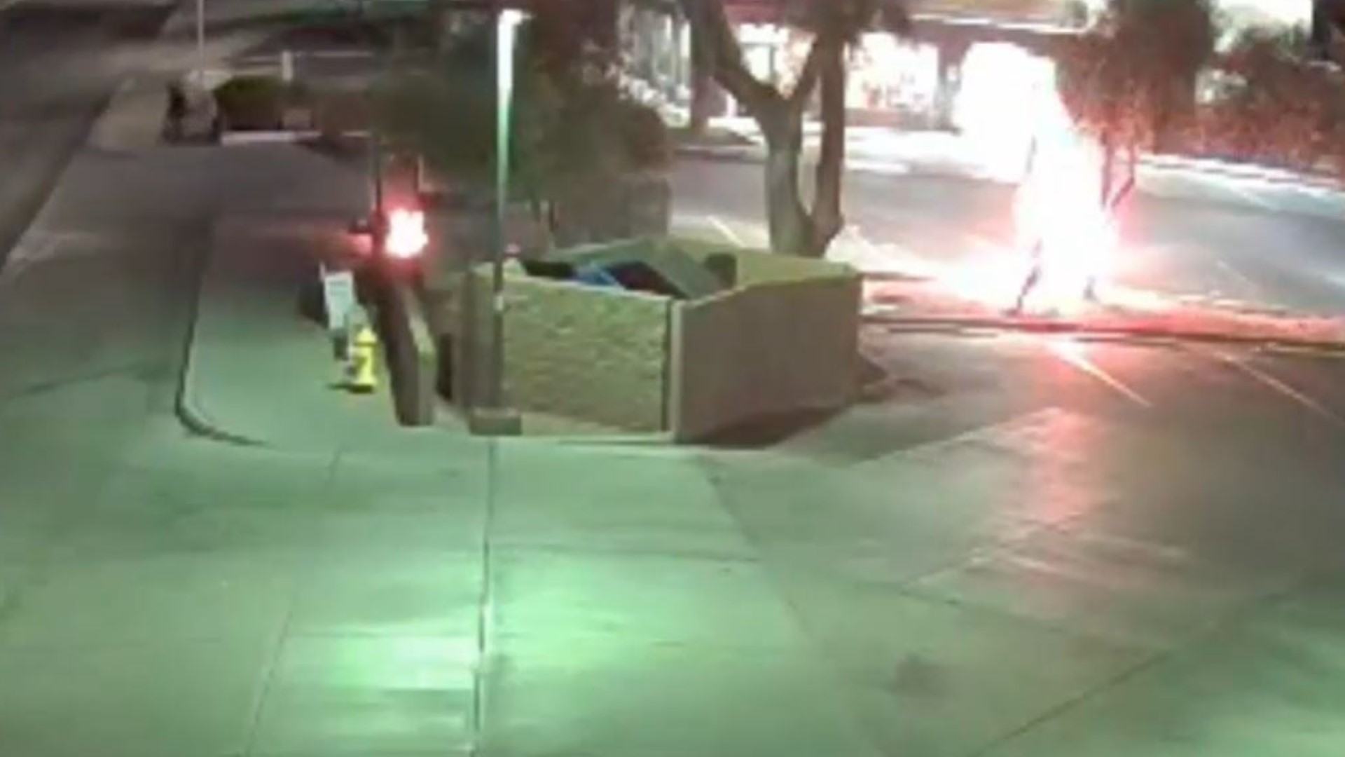 Viewer discretion advised: Street cameras captured the moment the man erupted into a ball of flames while at a bus stop.