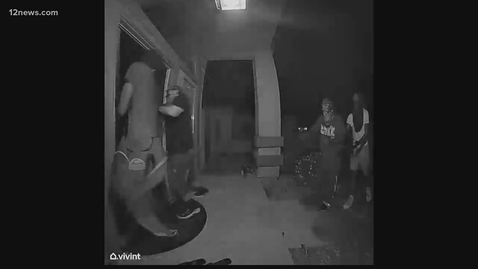 A Phoenix homeowner was seen on video shooting at suspects who were trying to break into a home, and police are asking for tips to find them.