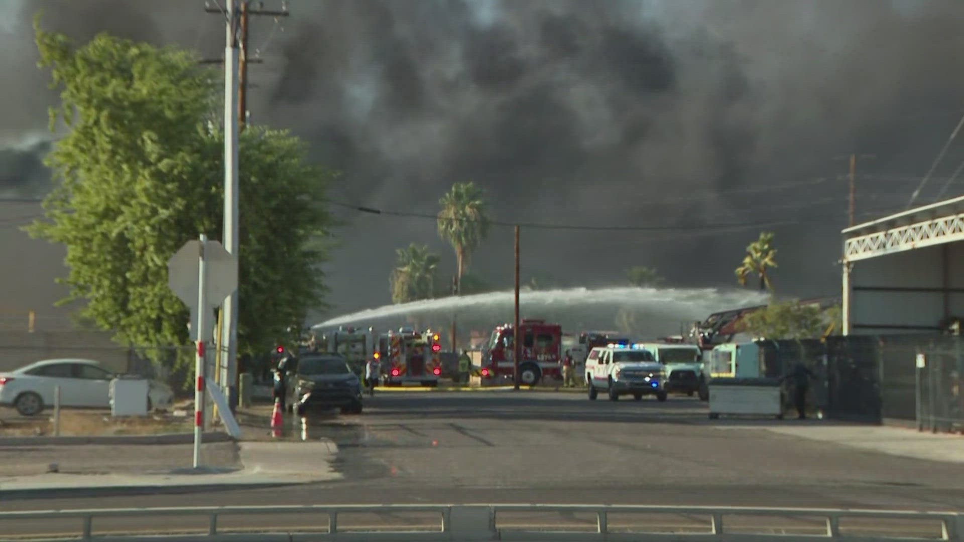 Officials have cleared a 1-mile radius around the fire near 40th street and Washington.