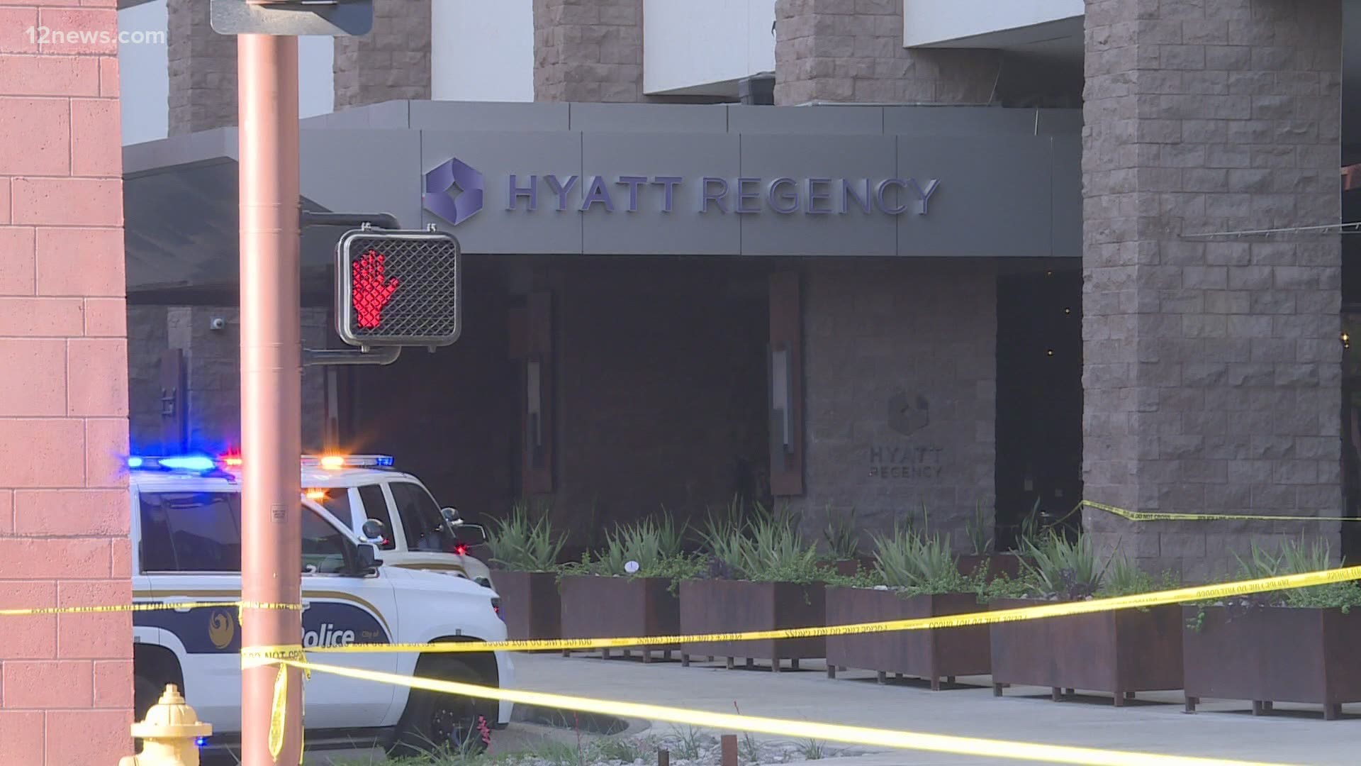 Police officers found a man dead and seven other people with gunshot injuries inside one of downtown Phoenix's largest hotels early Sunday morning, officials said.