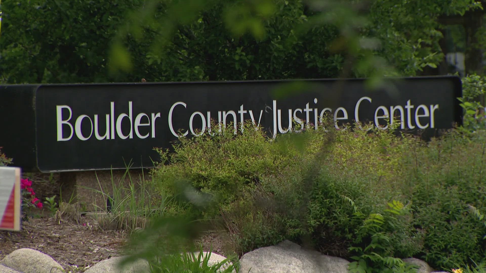 The suspect accused in an attack against a group of people raising awareness of Israeli hostages Sunday is facing 118 criminal charges in Boulder District Court.