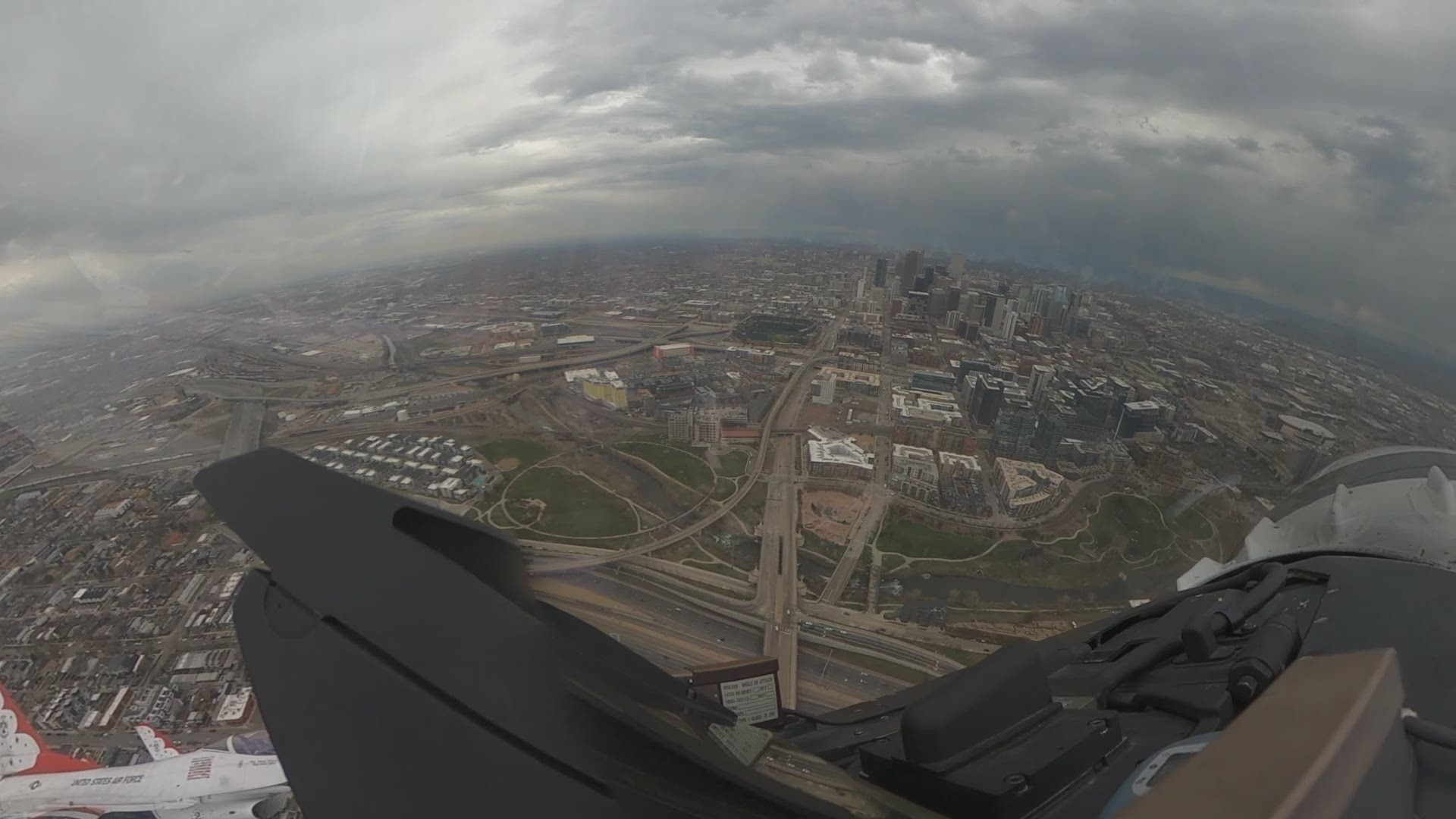 The United States Air Force Thunderbirds fly over downtown Denver to honor healthcare workers following the Air Force Academy graduation.