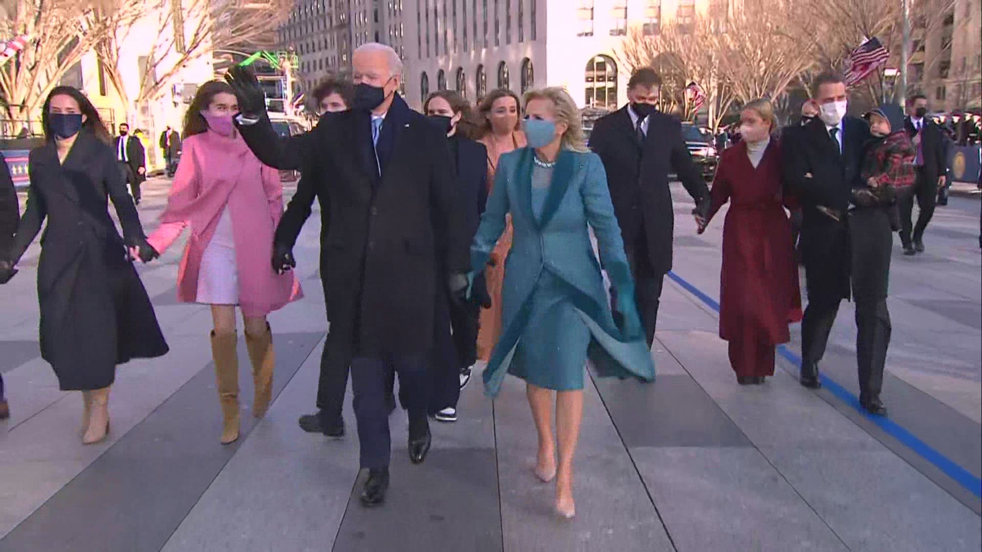 President Joe Biden walks from his motorcade to the White House.