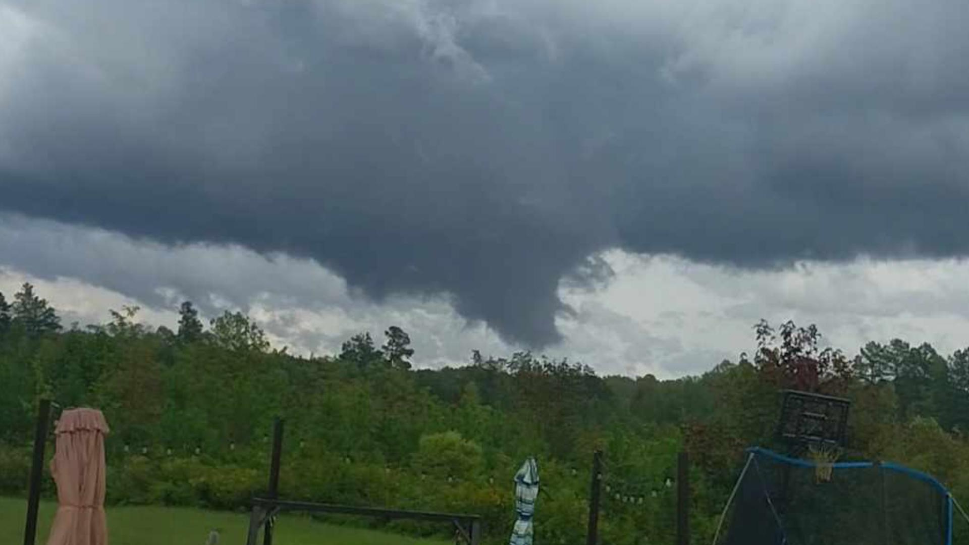 A viewer in Stoneville films their backyard as a funnel cloud appears to form. Wes-Emiley Stowe