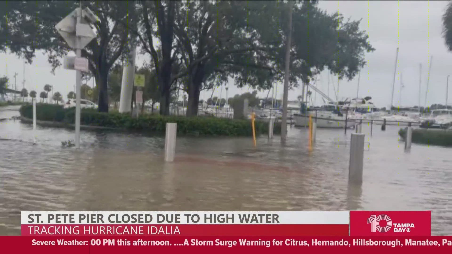 Storm surges have destroyed boats, closed marinas, and left roads and cars sunk on roadways.