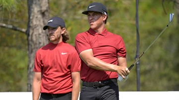 PGA tour golfers honor Tiger Woods by wearing red