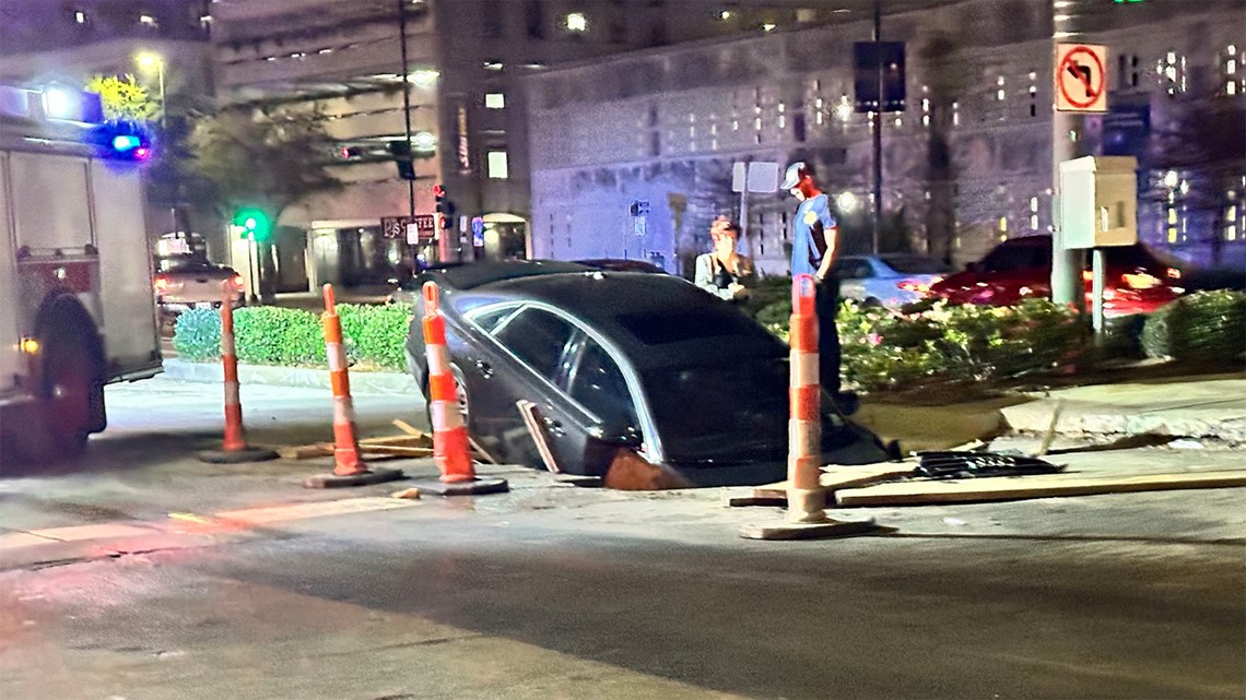 Massive hole swallows car on New Orleans street | 12news.com