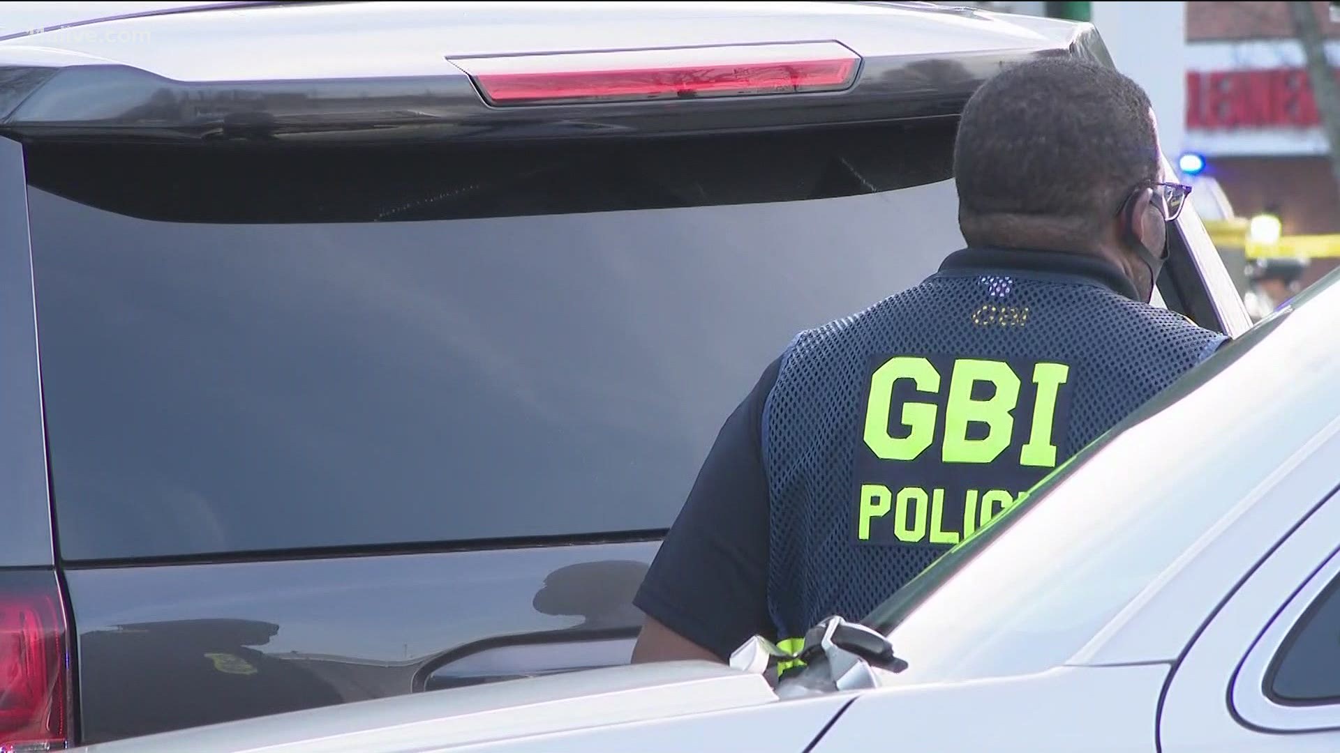 The GBI said the man, who is in critical condition, allegedly approached the officer and refused multiple commands to drop the weapon.